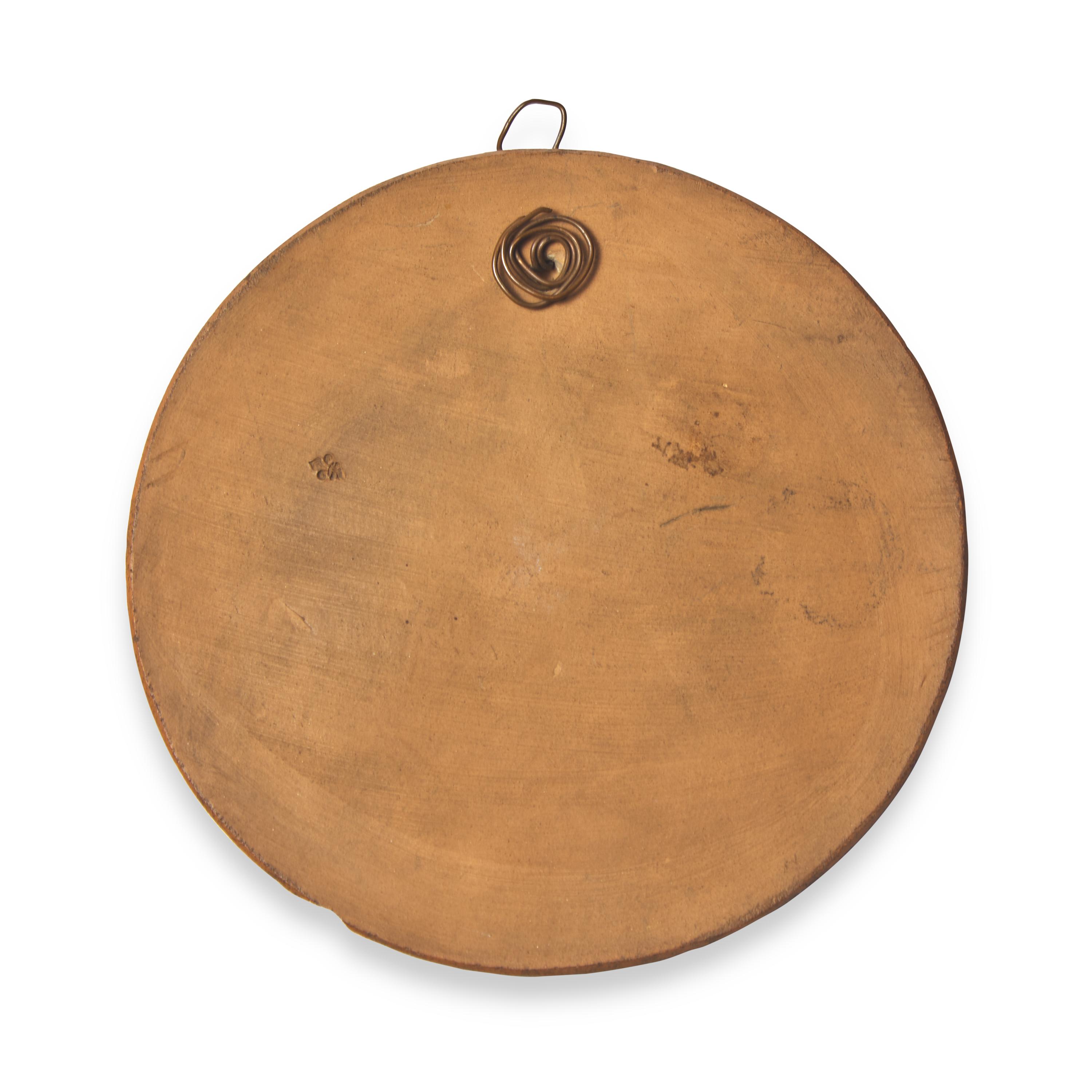 Jean-Baptiste Nini, (Italian, 1717-1786), A Terracotta Medallion of Benjamin Franklin in a Fur Cap