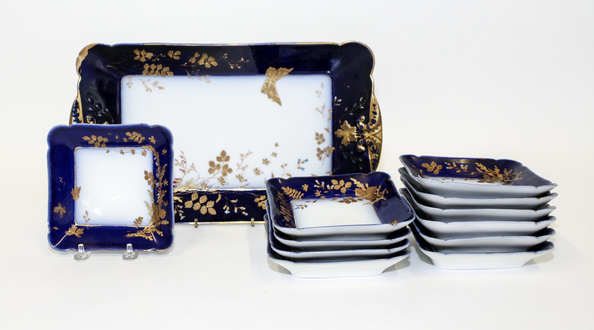 A Haviland Limoges Porcelain Table Service Width of platter 13 inches.