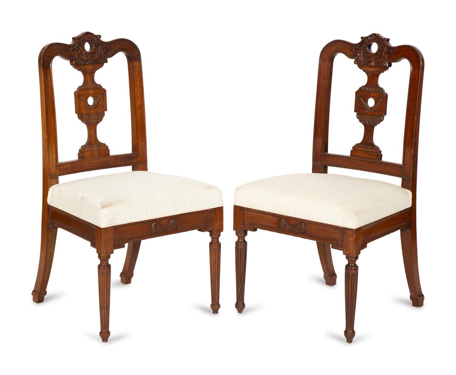 A Set of Eight Italian Walnut Dining Chairs