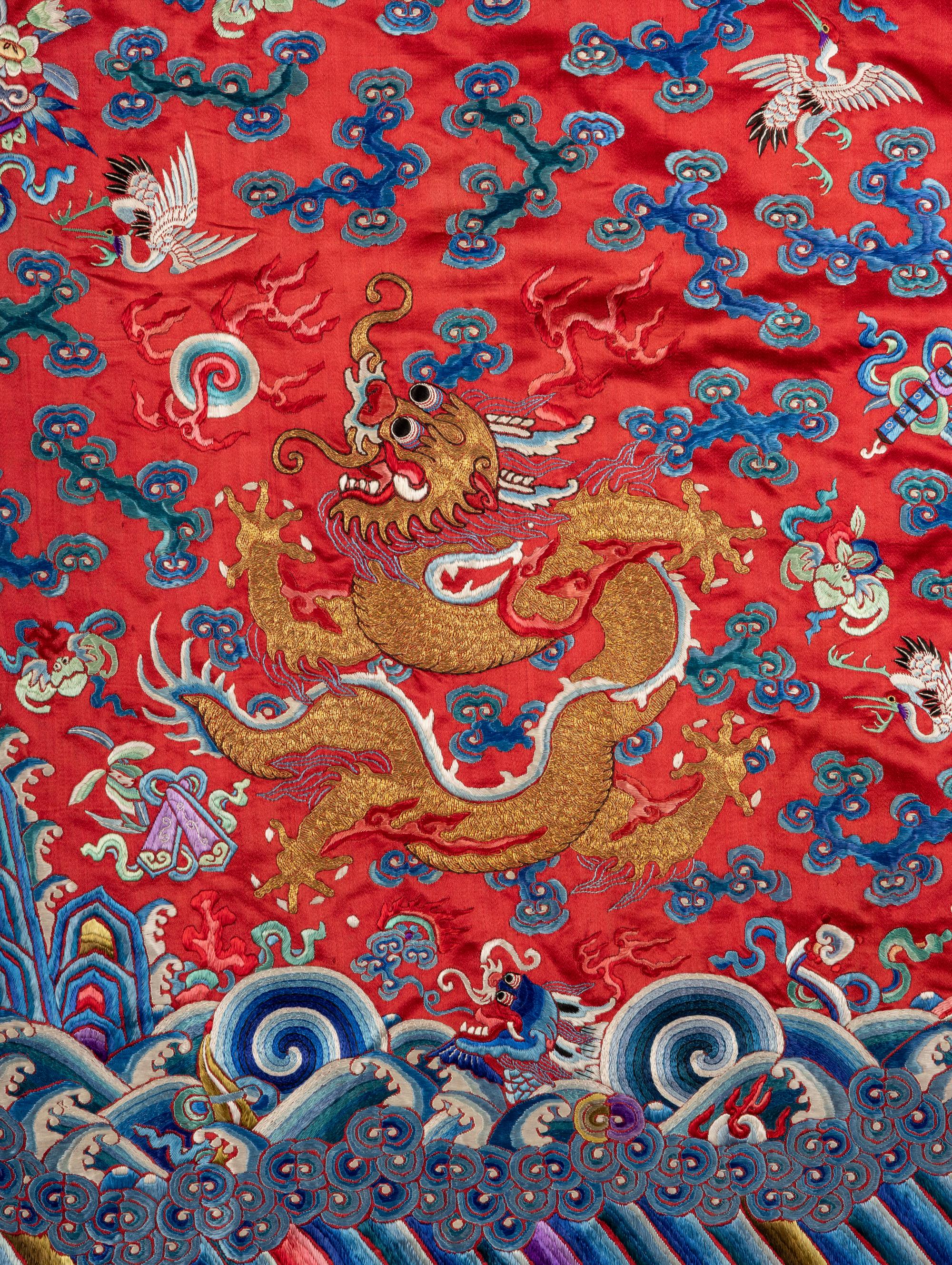 A Chinese Red Ground Embroidered Silk Dragon Robe, Late 19th-20th Century 晚清-民國 紅緞地龍袍