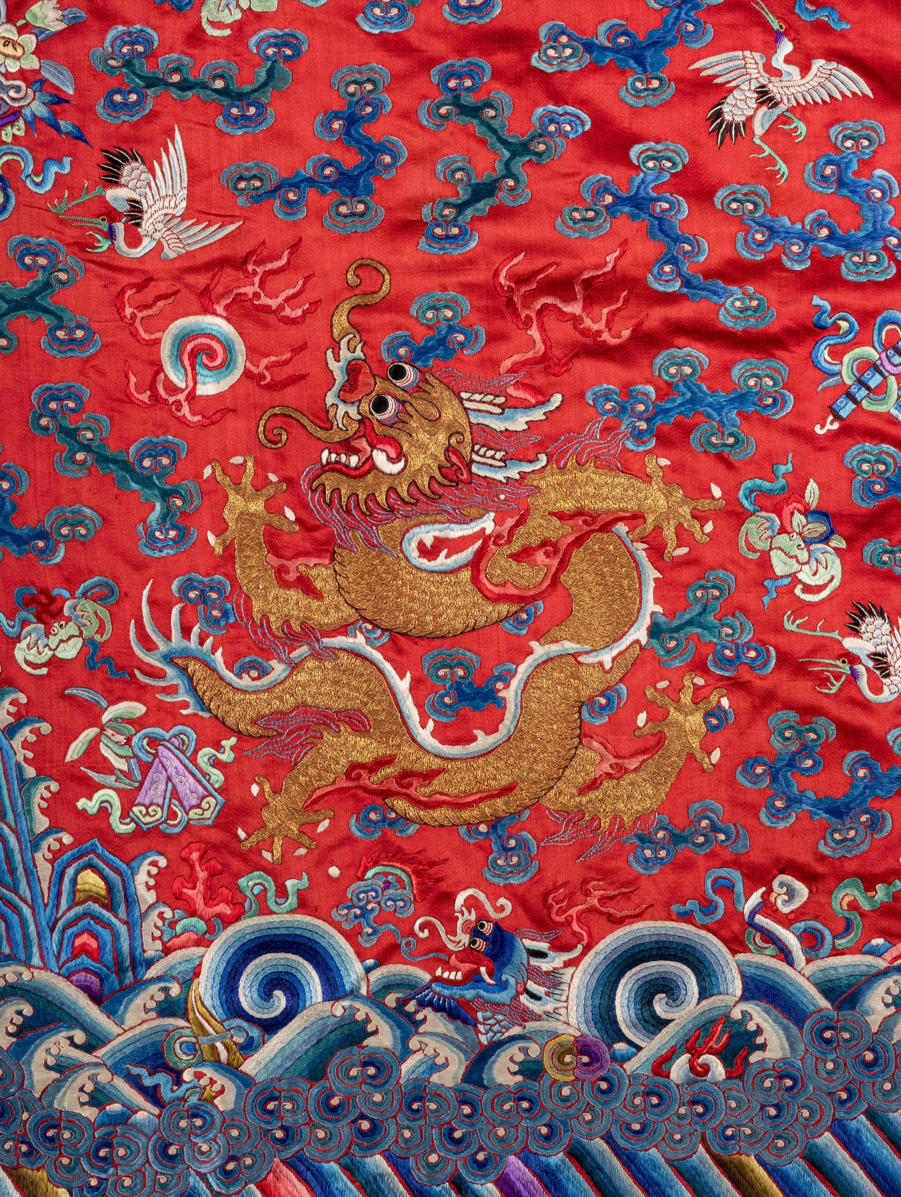 A Chinese Red Ground Embroidered Silk Dragon Robe, Late 19th-20th Century 晚清-民國 紅緞地龍袍