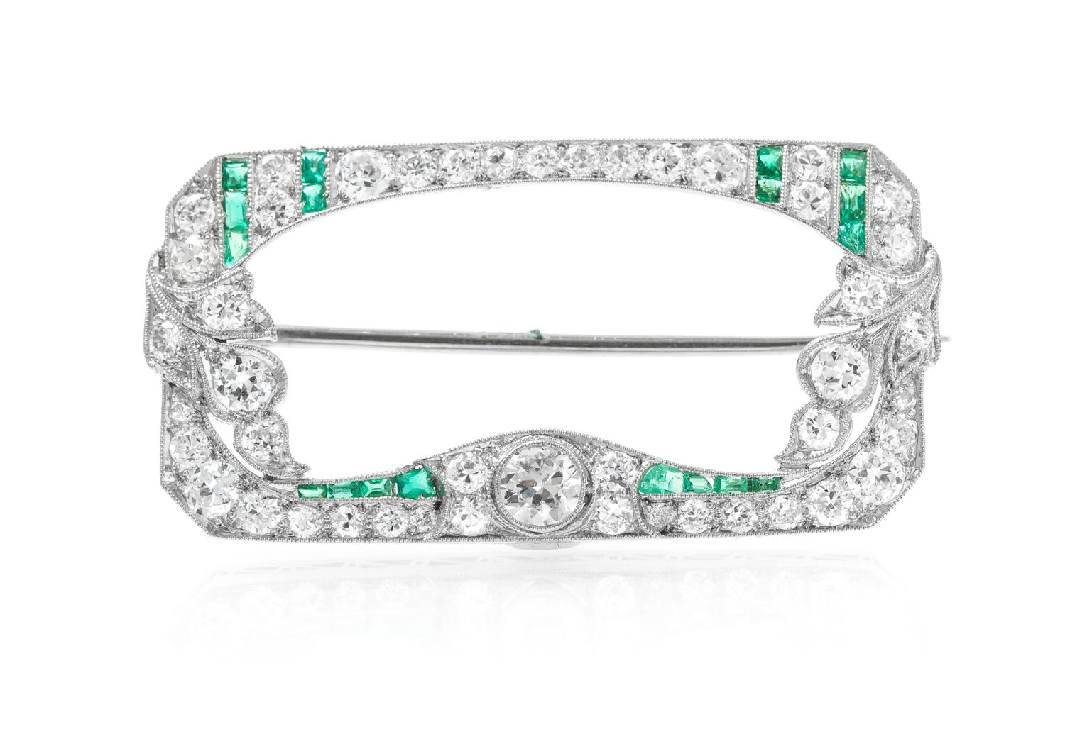 A Platinum, Diamond, and Emerald Brooch, 4.60 dwts.