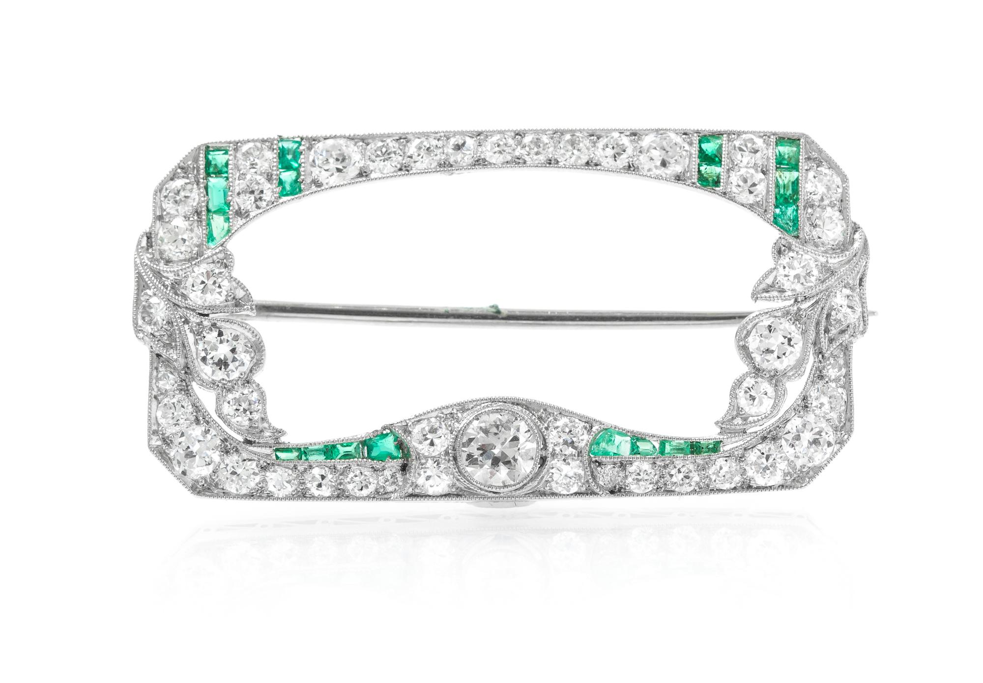 A Platinum, Diamond, and Emerald Brooch, 4.60 dwts.