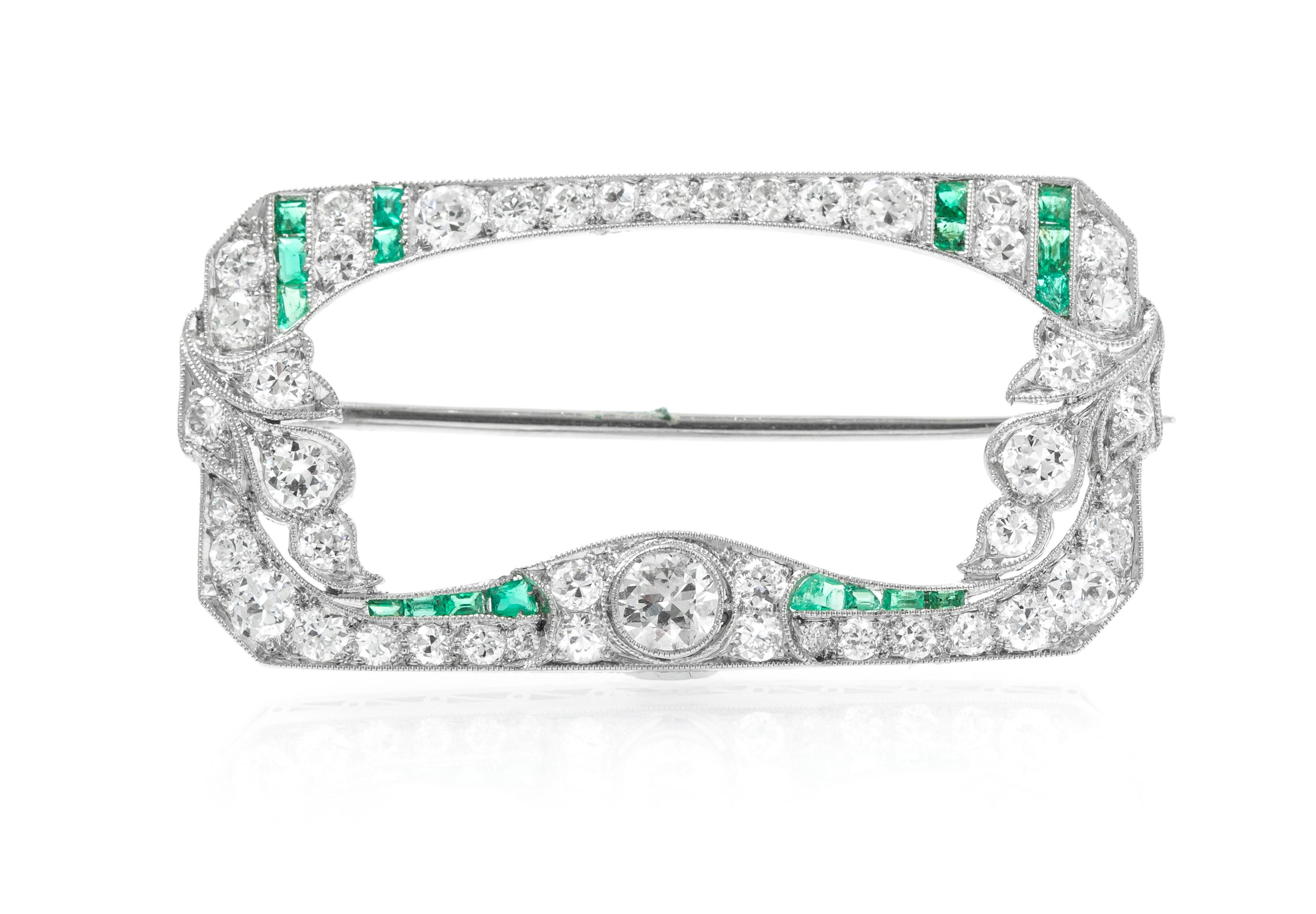 A Platinum, Diamond, and Emerald Brooch, 4.60 dwts.