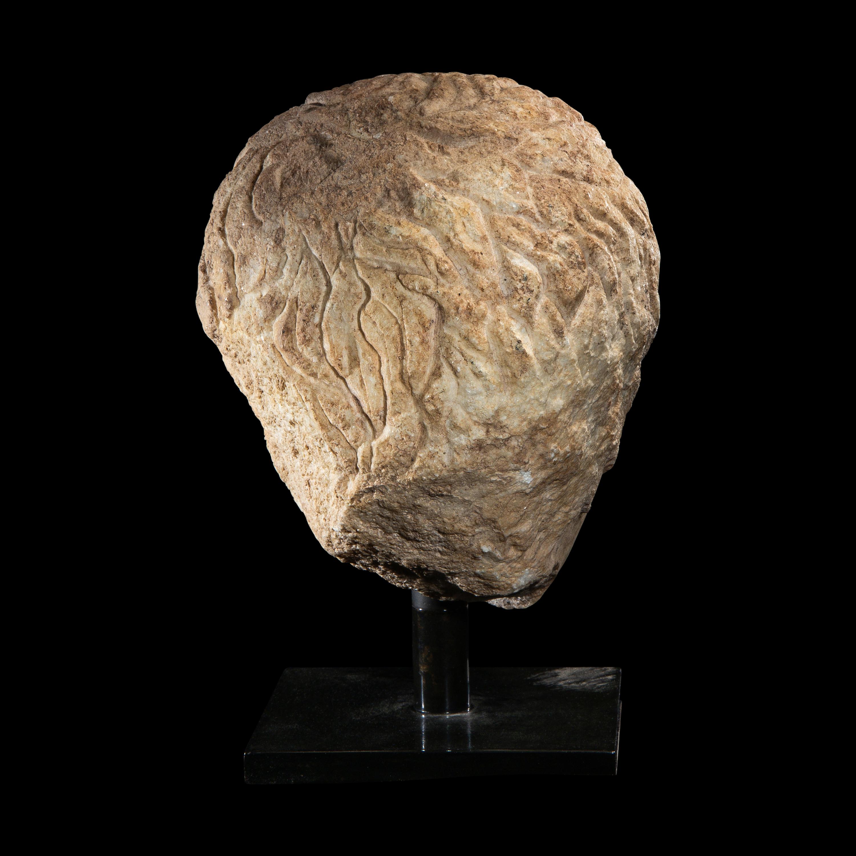 A Roman Marble Portrait Head of a Youth