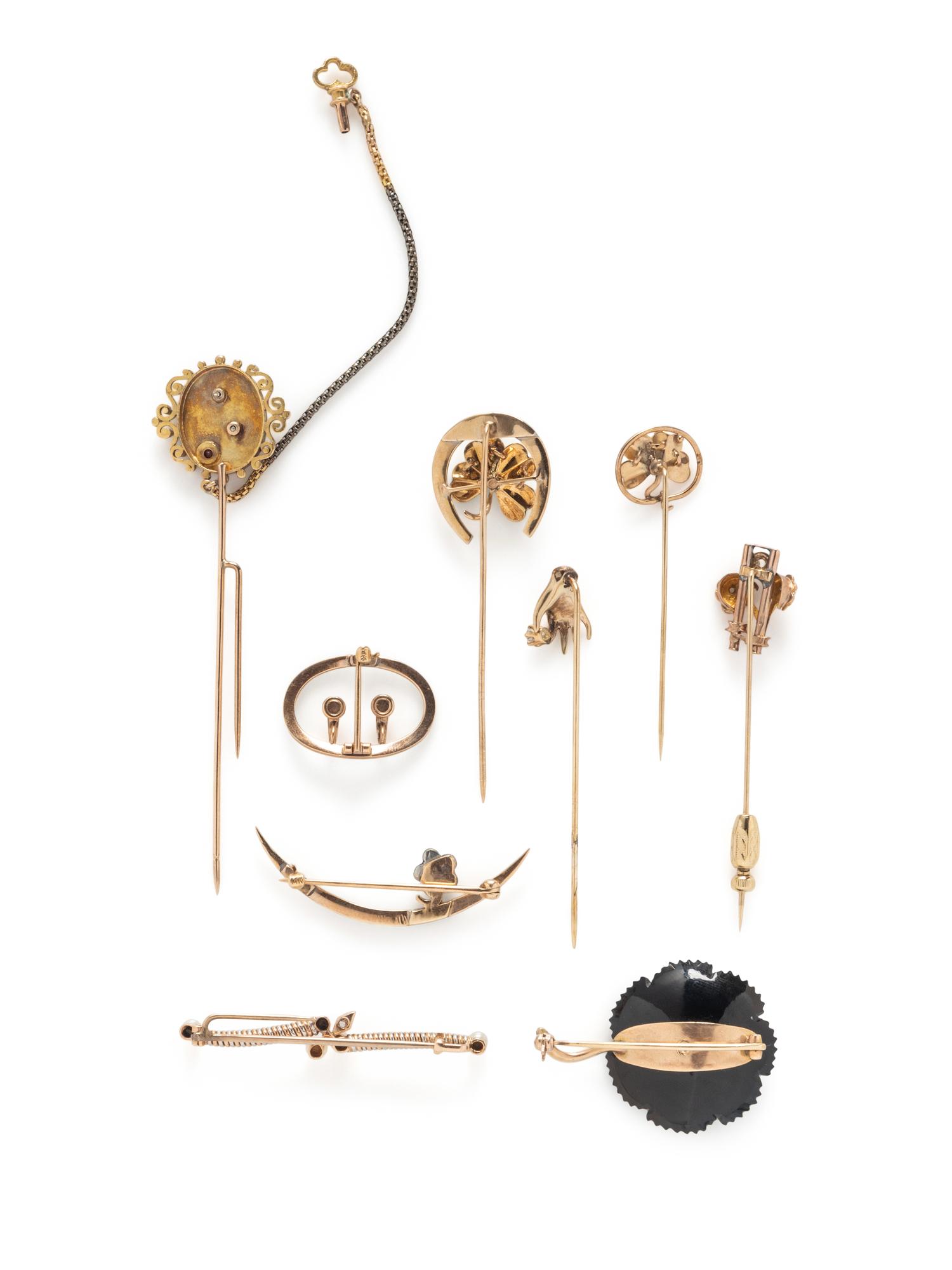 COLLECTION OF STICKPINS AND BROOCHES