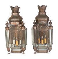 A Pair of Middle Eastern Stamped Metal and Glass Sconces — 20TH CENTURY