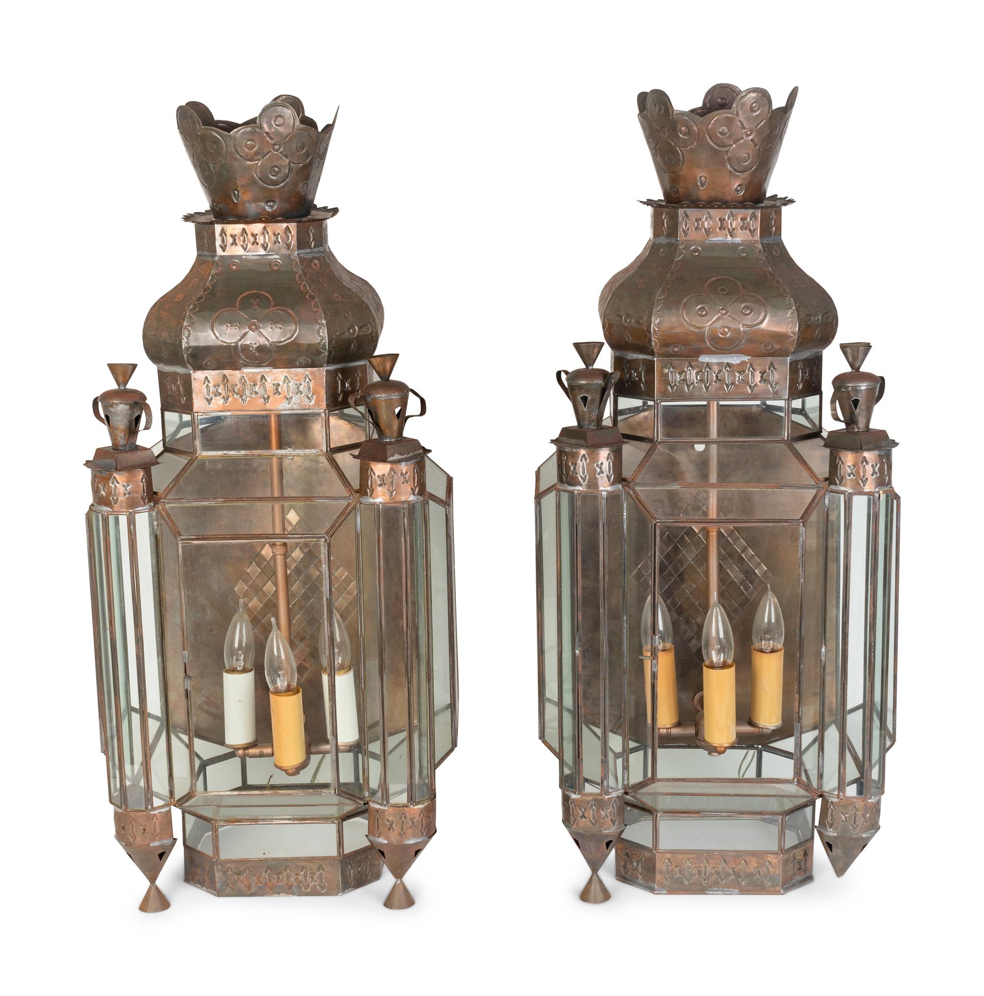 A Pair of Middle Eastern Stamped Metal and Glass Sconces — 20TH CENTURY