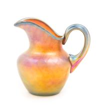 Steuben, FIRST HALF 20TH CENTURY, an iridescent glass ewer