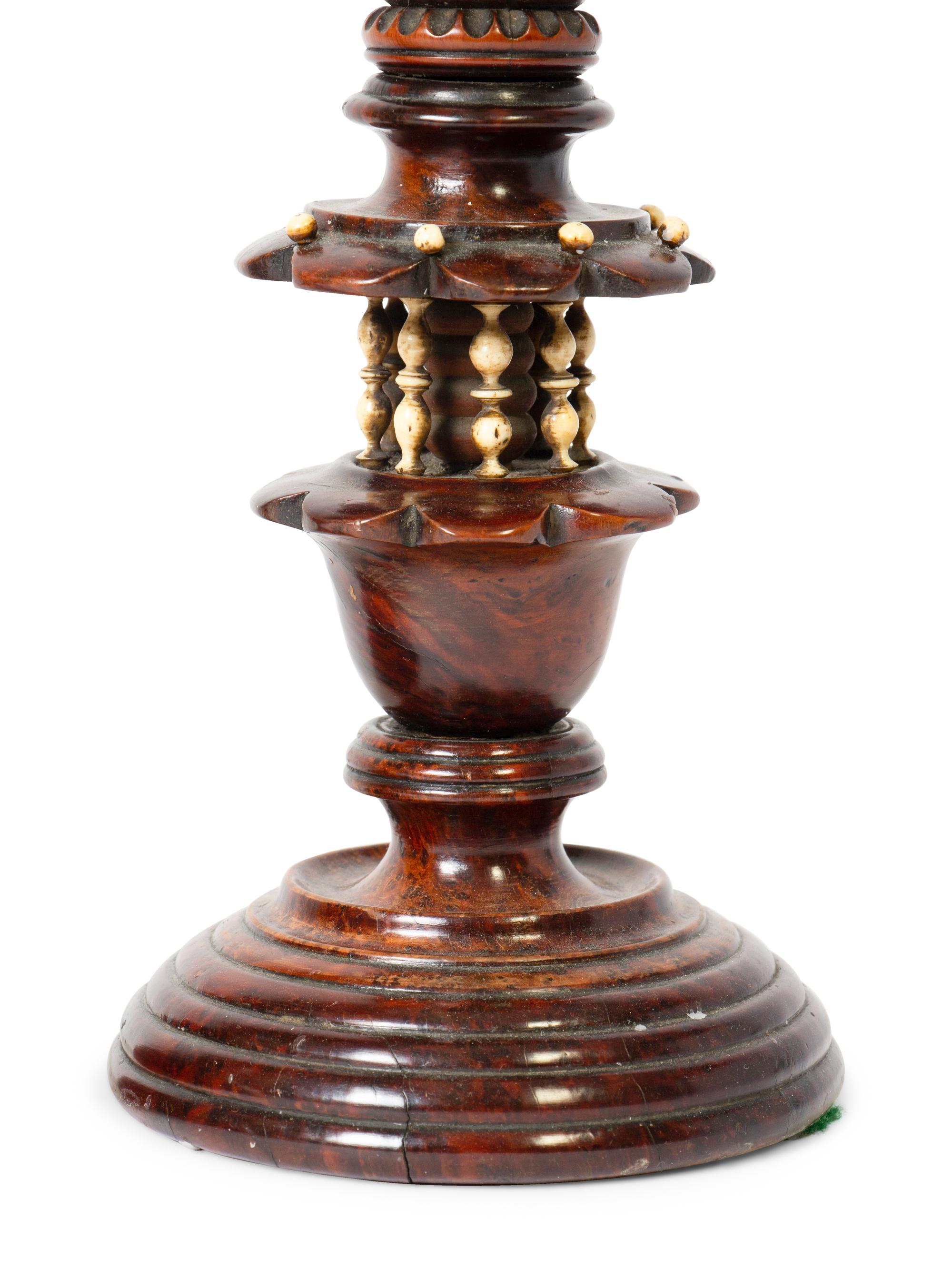 A Pair of Continental Wooden Candlesticks