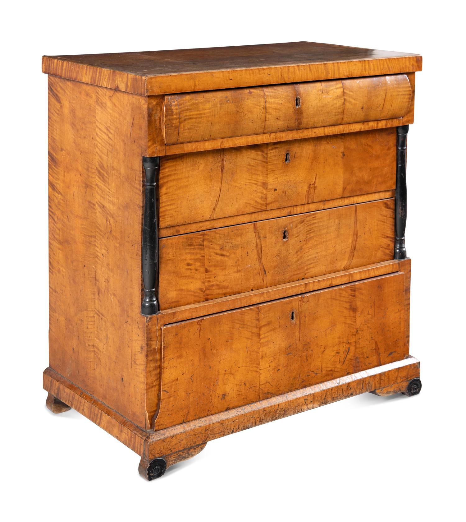 A Biedermeier Maple Chest of Drawers