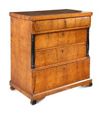 A Biedermeier Maple Chest of Drawers