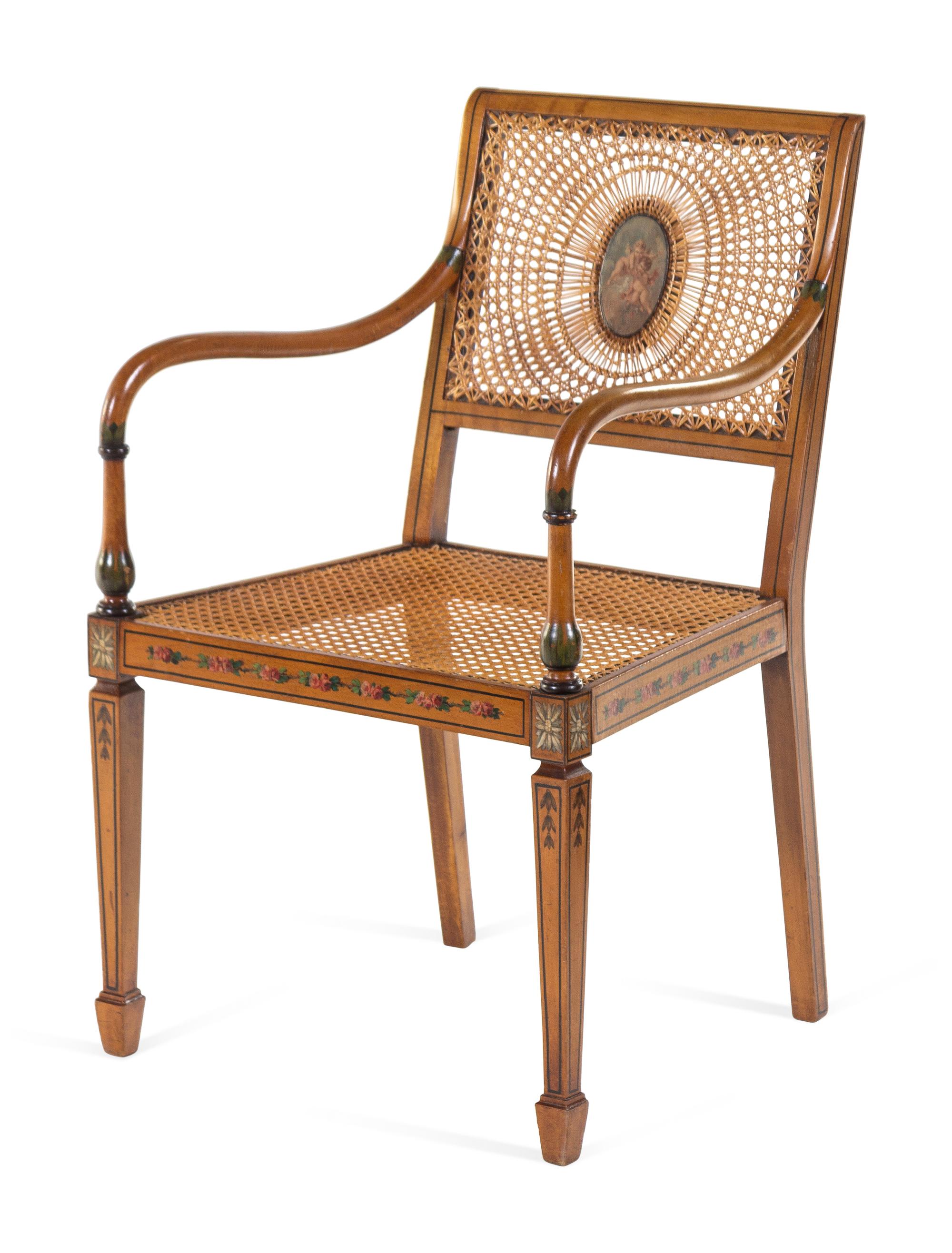 An Edwardian Painted Beechwood Cane Upholstered Armchair