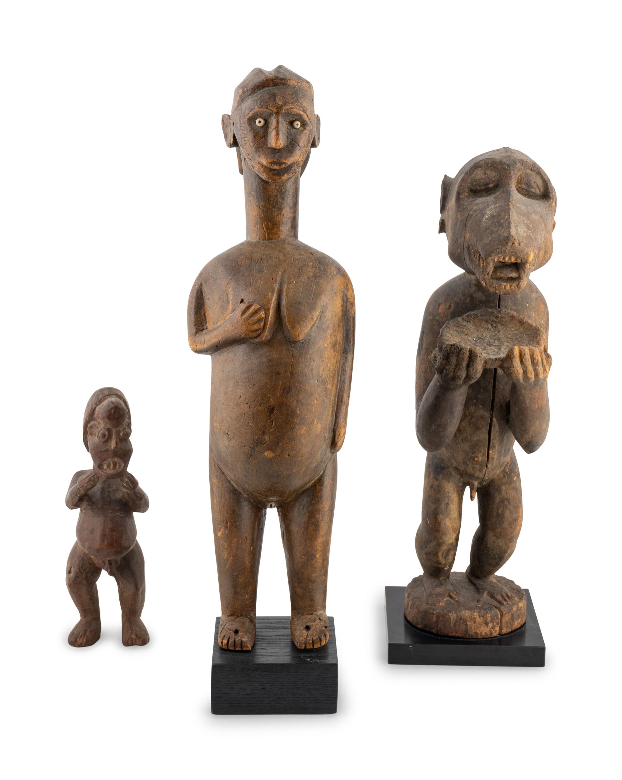 Three African Carved Wood Figures — 20TH CENTURY