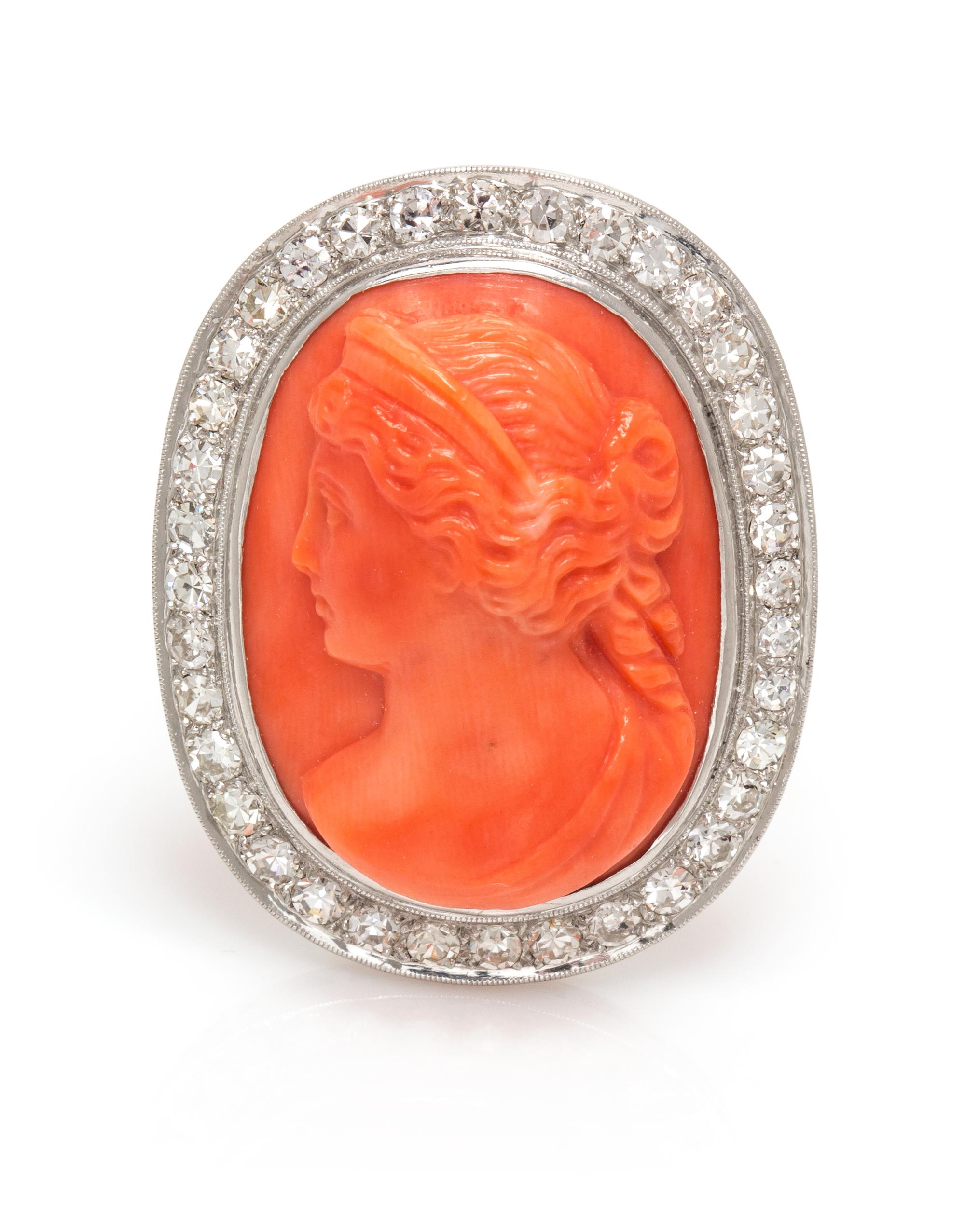 A Platinum, Coral Cameo and Diamond Brooch, 6.90 dwts.