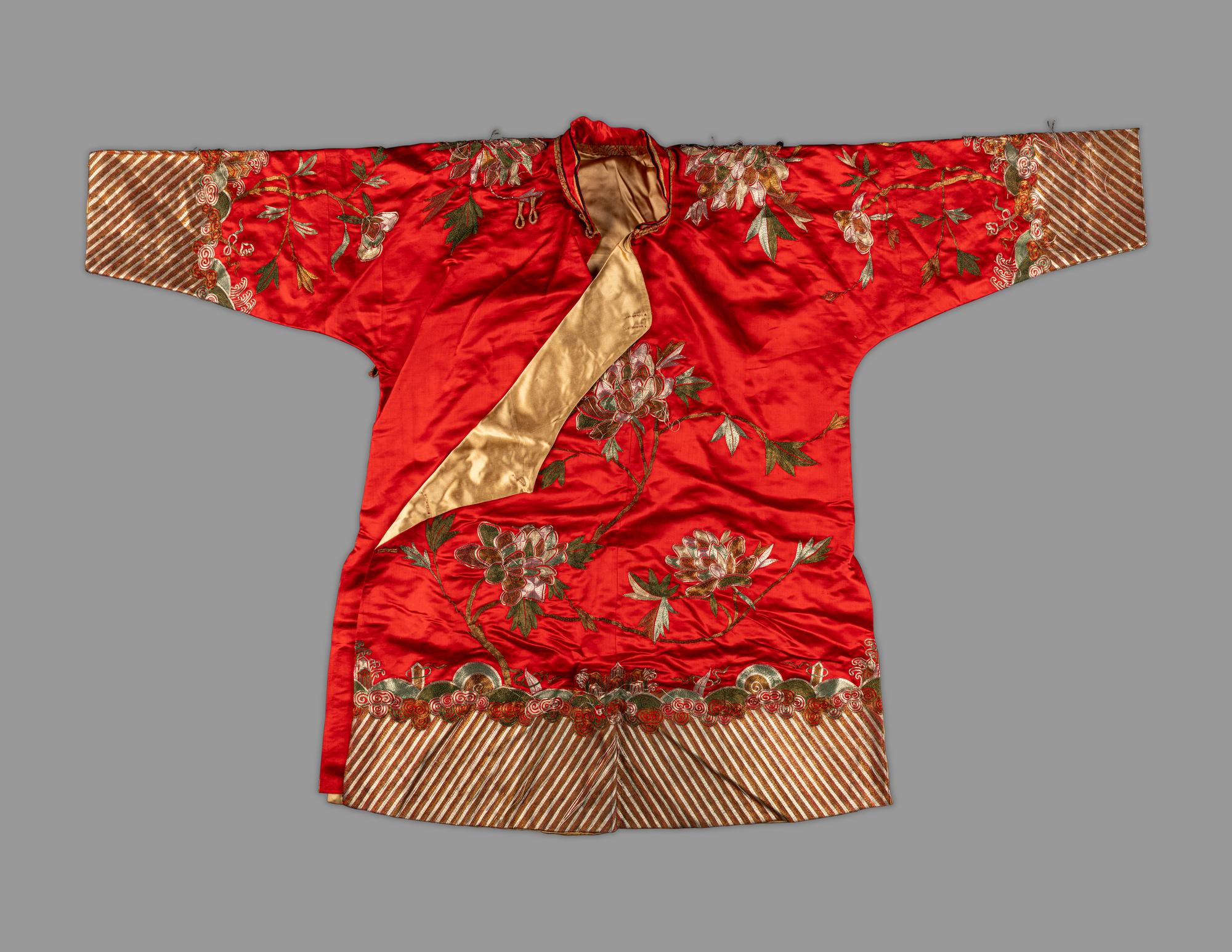 A Chinese Red Ground Embroidered Silk Jacket