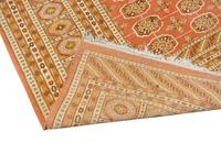 A Pakistani Bokhara Wool Rug — 20TH CENTURY