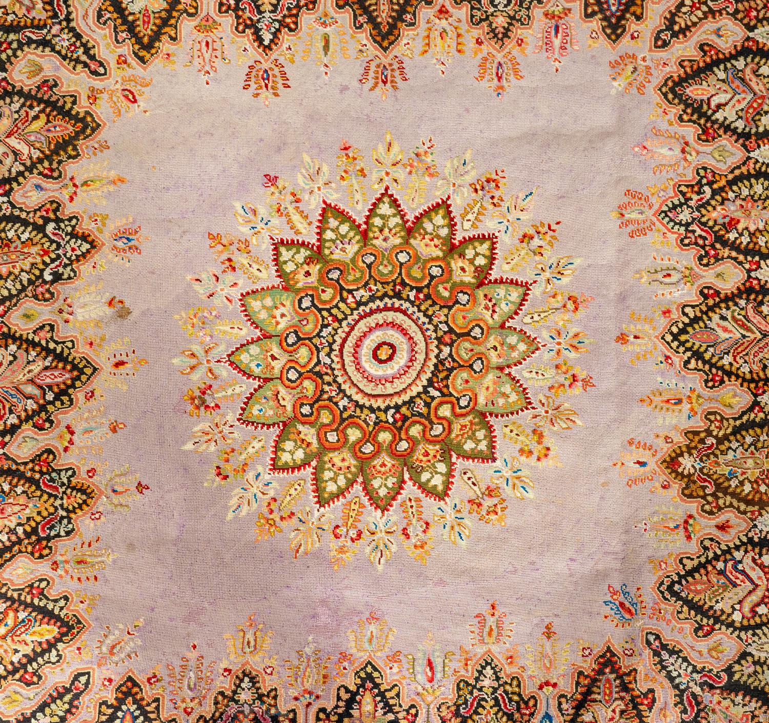 A Persian Paisley Needlework Rug