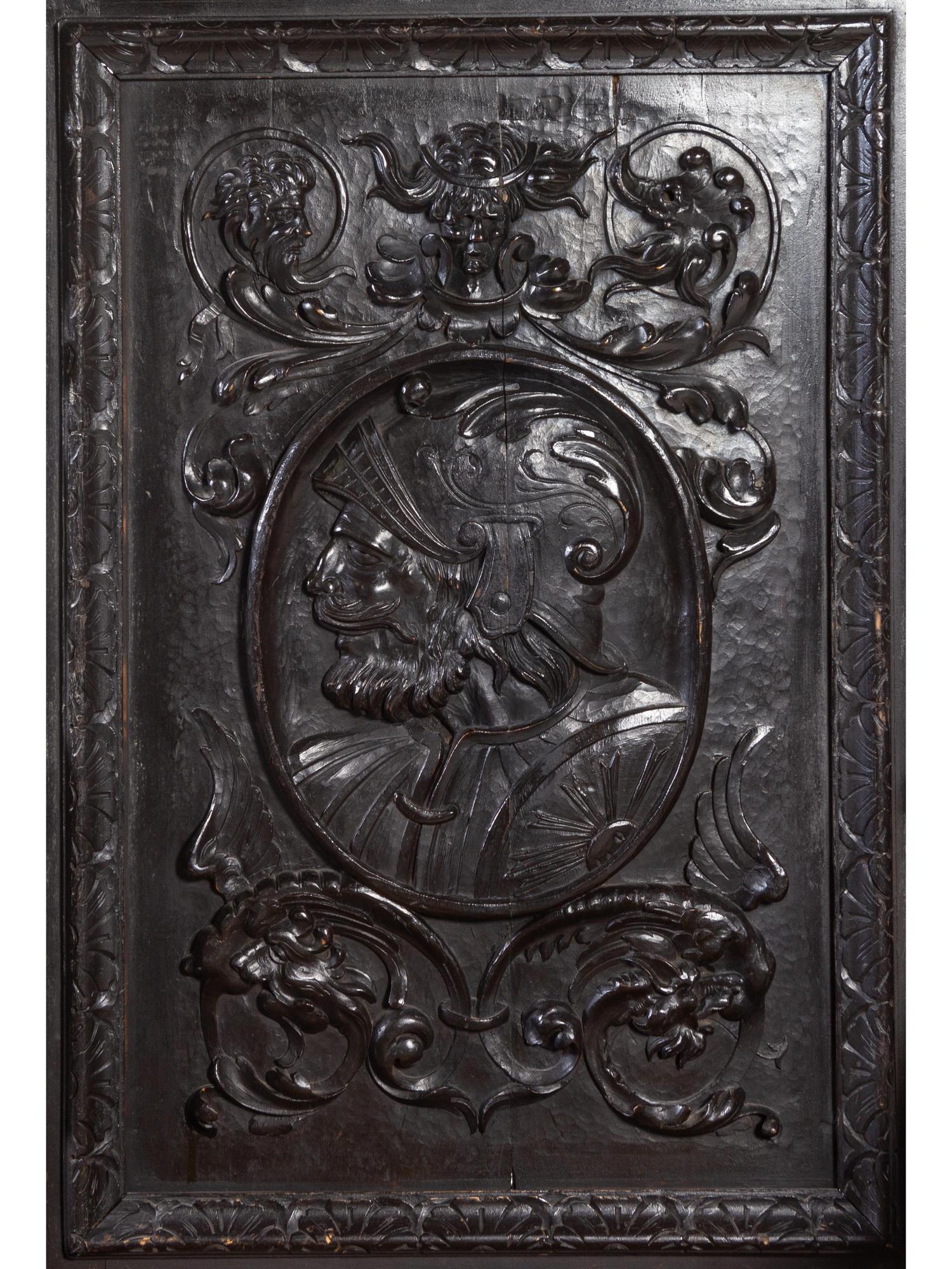 A Jacobean Carved Oak Hall Chair