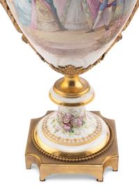 A Sèvres Style Gilt Bronze Mounted Porcelain Urn