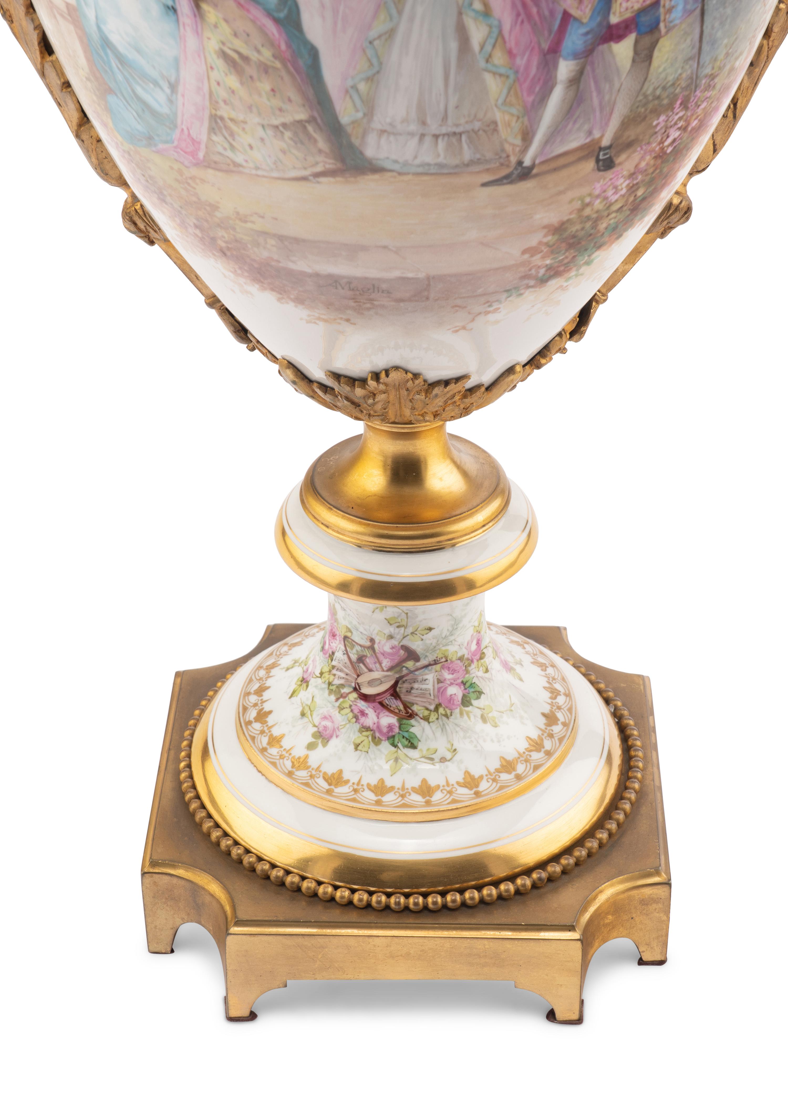 A Sèvres Style Gilt Bronze Mounted Porcelain Urn