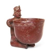 A Pre-Columbian Terracotta Figural Vessel, Colima, Height 14 inches.