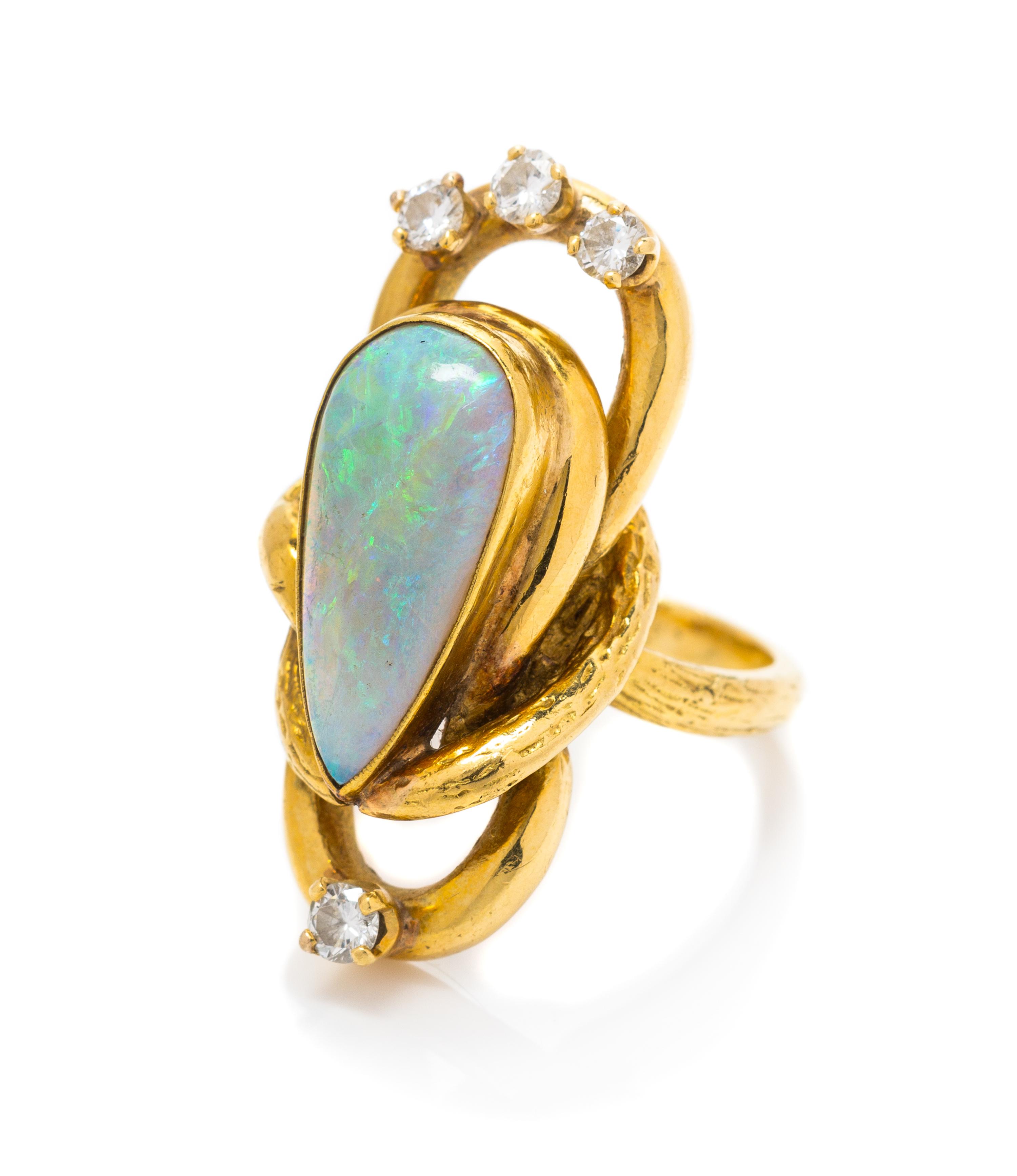 A 18 Karat Yellow Gold, Opal and Diamond Ring, 10.80 dwts.
