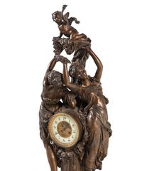 A Continental Cast Metal and Onyx Figural Mantel Clock