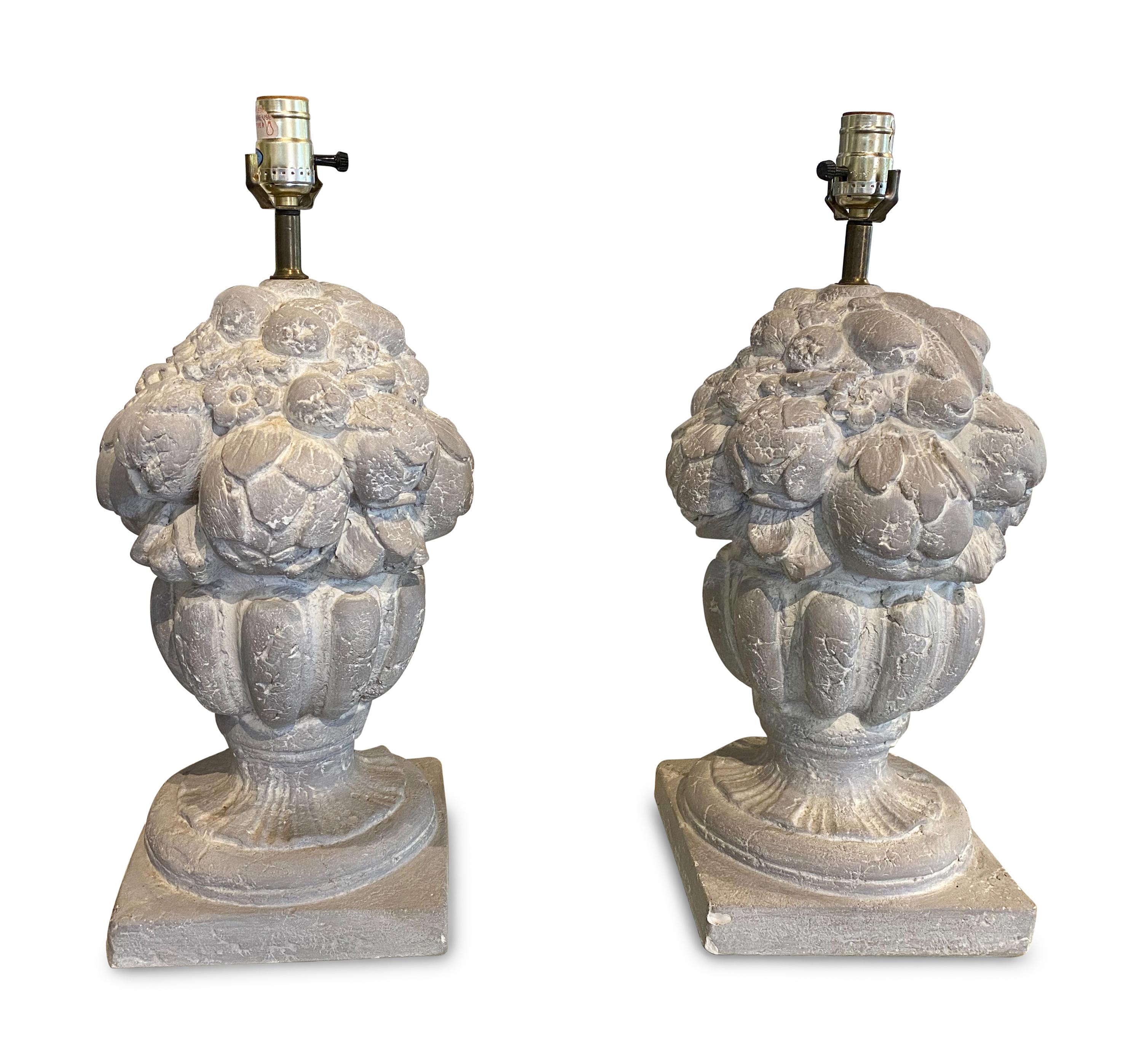 A Pair of Cast Stone Finials Mounted as Lamps