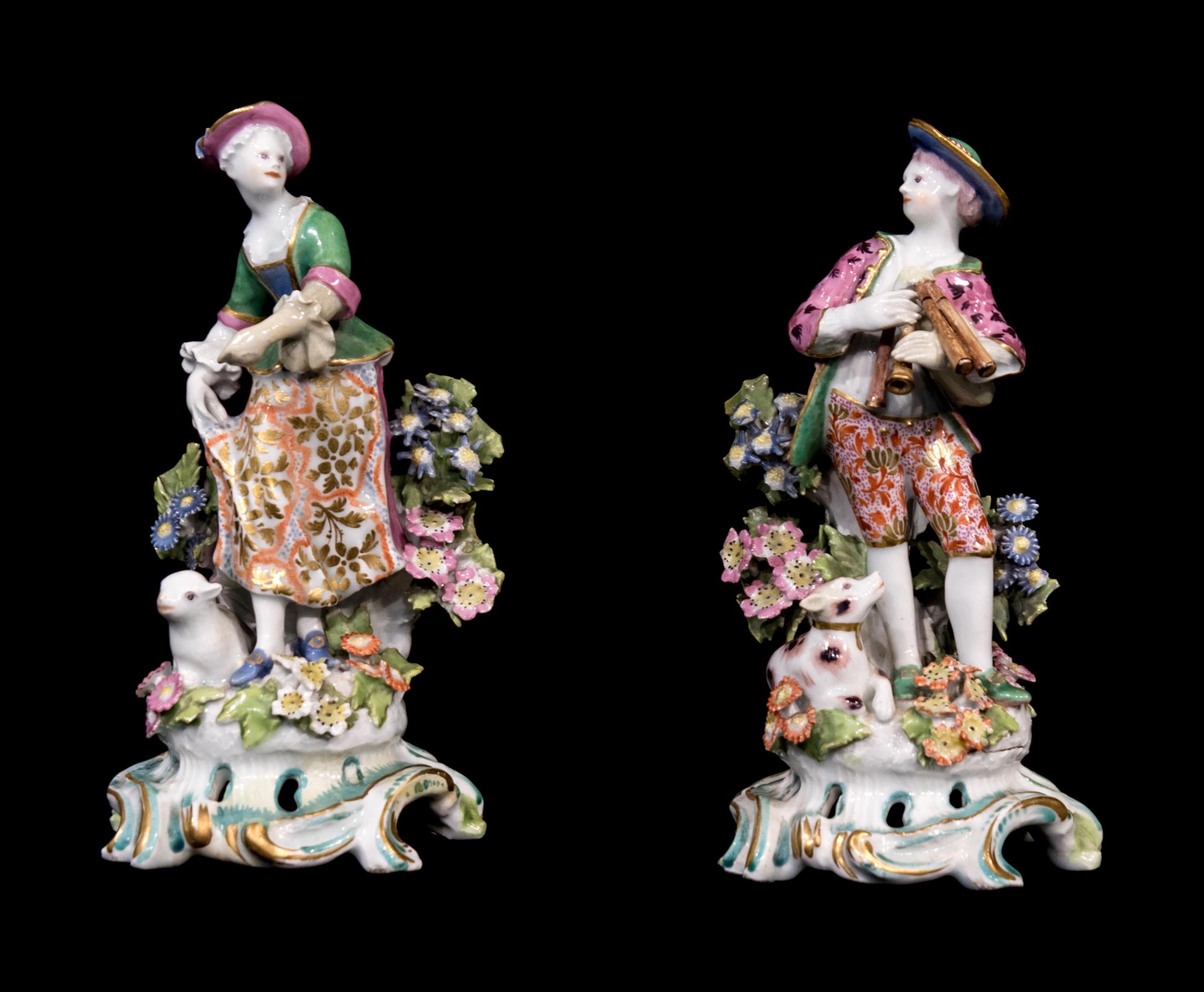 A Pair of Chelsea Porcelain Figures of a Boy and Girl — RED ANCHOR PERIOD, 1752-1756