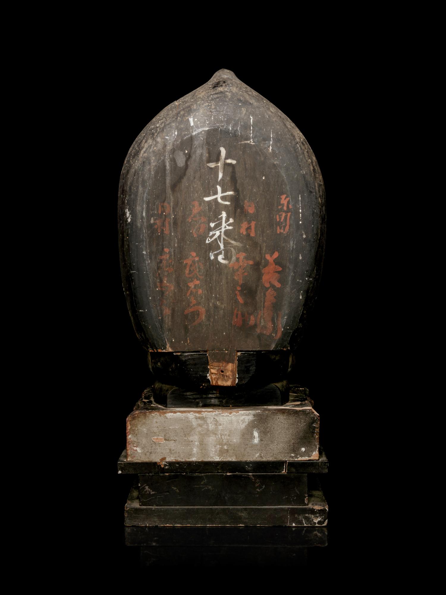 A Gilt Lacquered Wood Figure of Seated Kannan