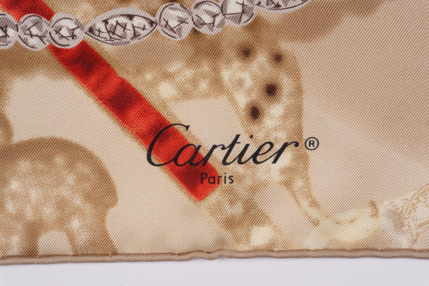 Three Hermès Scarves and One Cartier Scarf