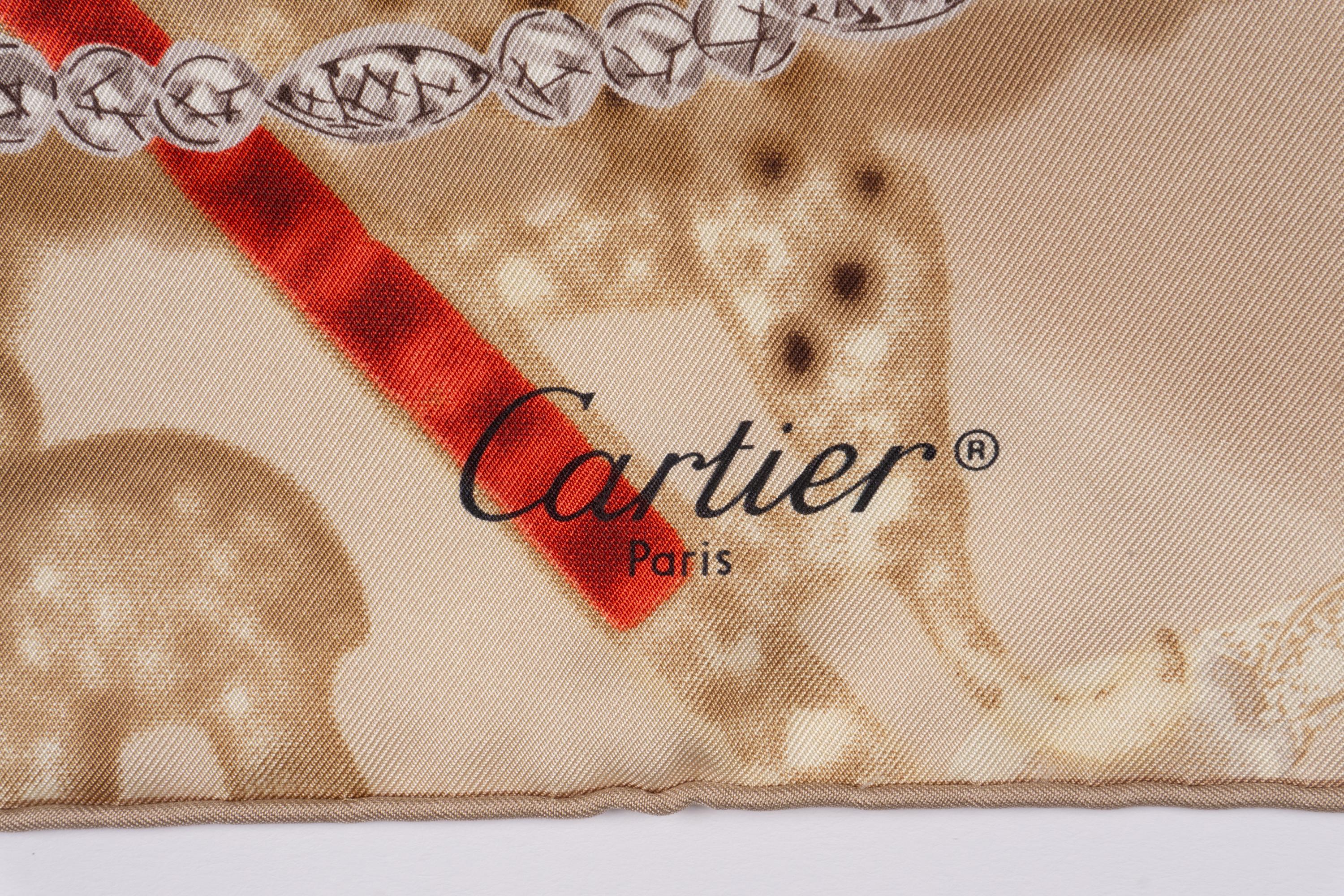 Three Hermès Scarves and One Cartier Scarf
