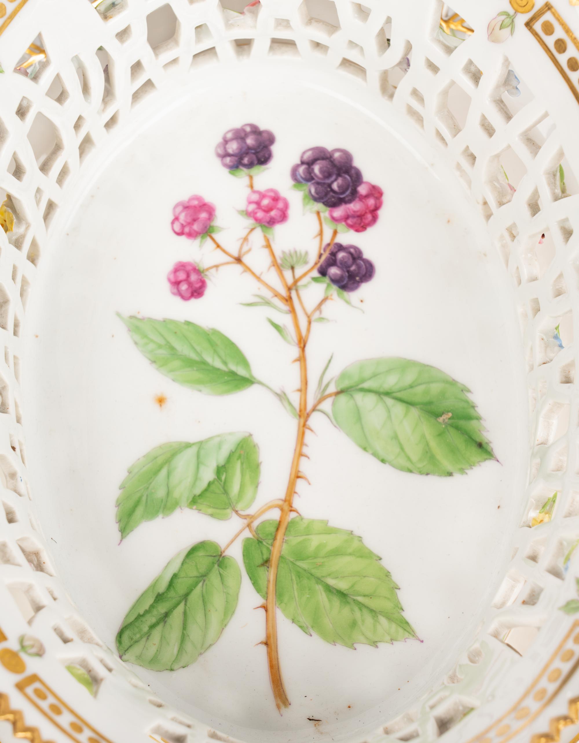 A Pair of Royal Copenhagen Flora Danica Reticulated Porcelain Oval Fruit Baskets and Stands