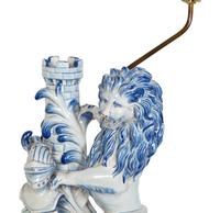 A Continental Faience Lion Group Mounted as a Lamp