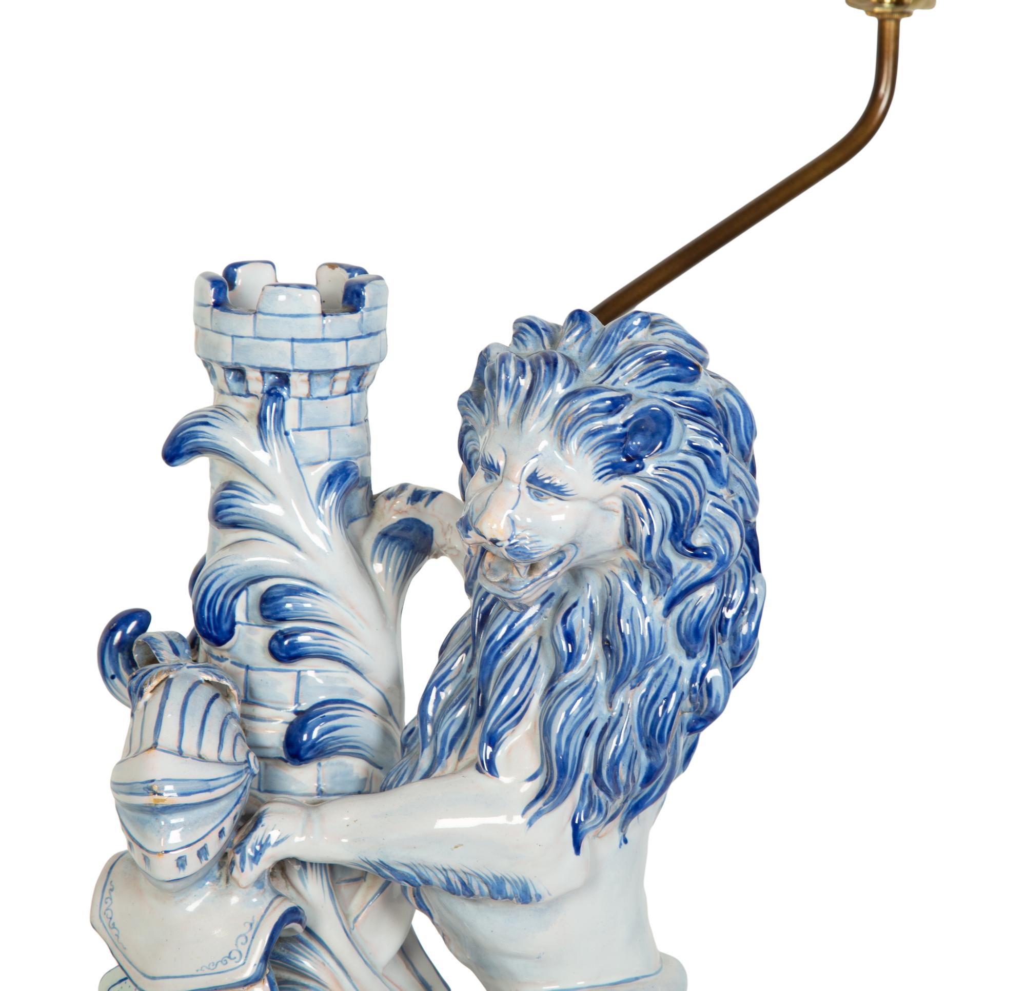 A Continental Faience Lion Group Mounted as a Lamp