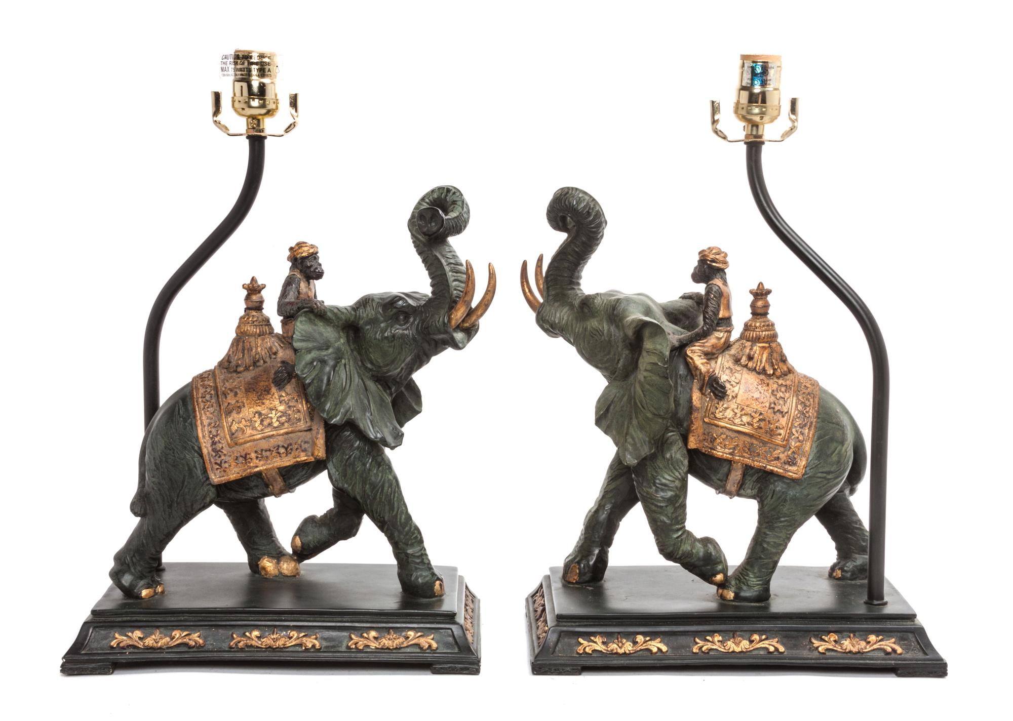 A Pair of Figural Table Lamps Height overall 24 inches.
