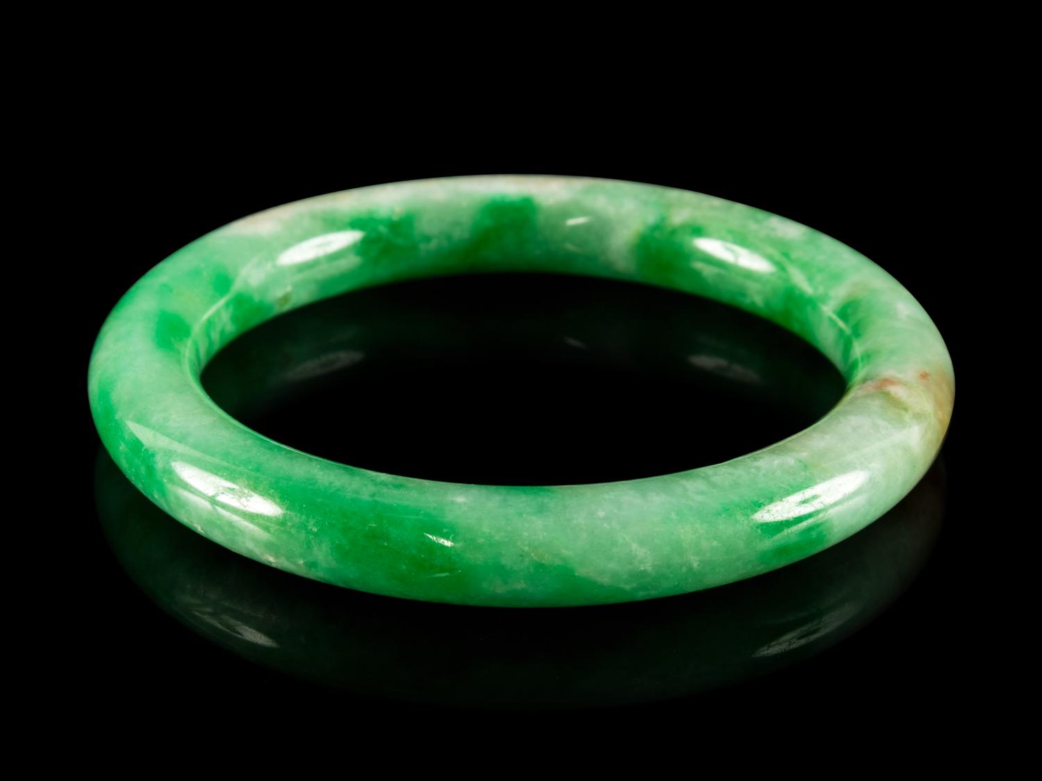 A Chinese Green Jadeite Bangle