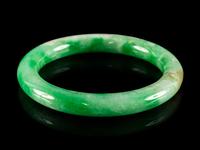 A Chinese Green Jadeite Bangle