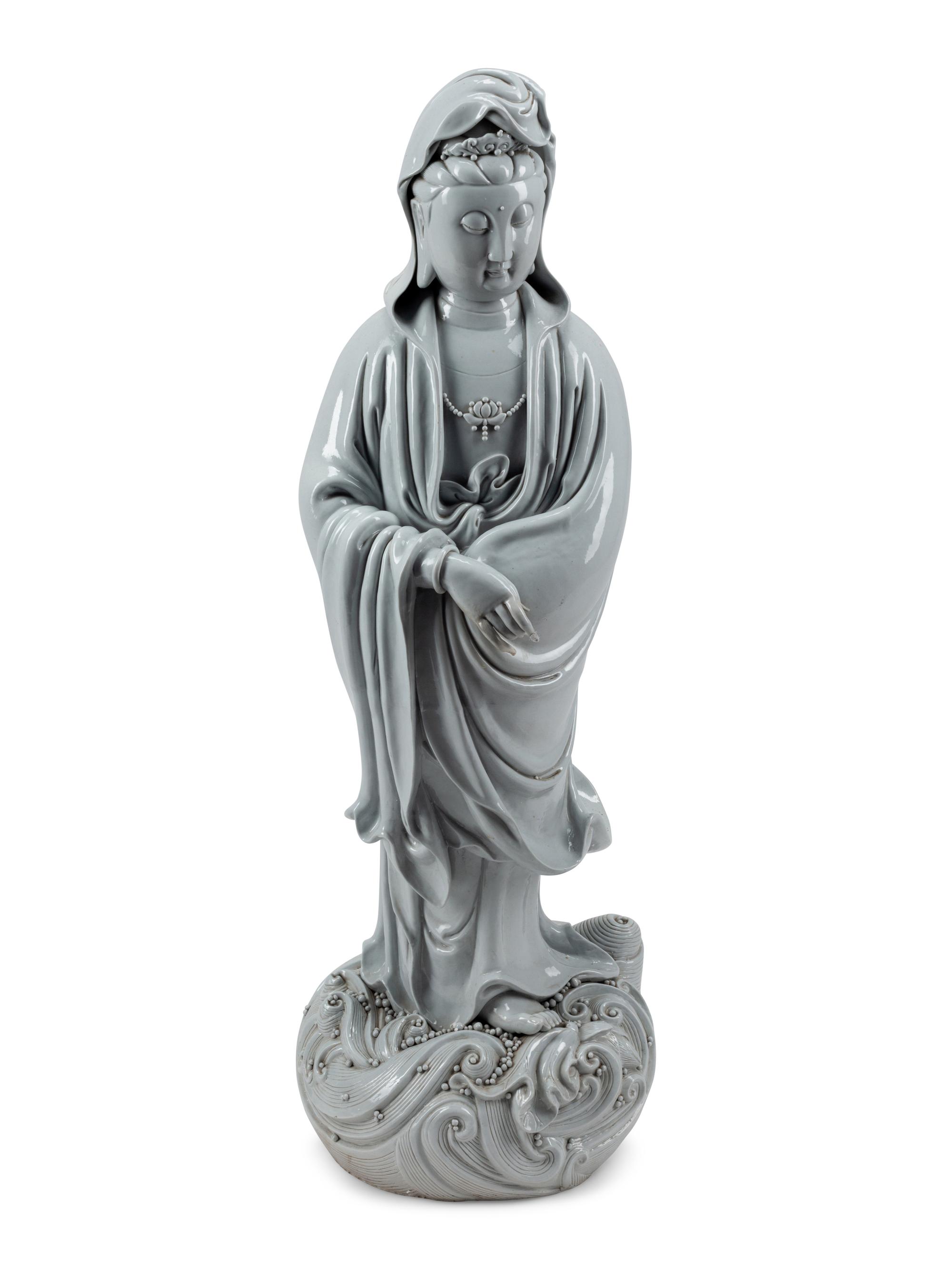 A Large Blanc de Chine Figure of Guanyin