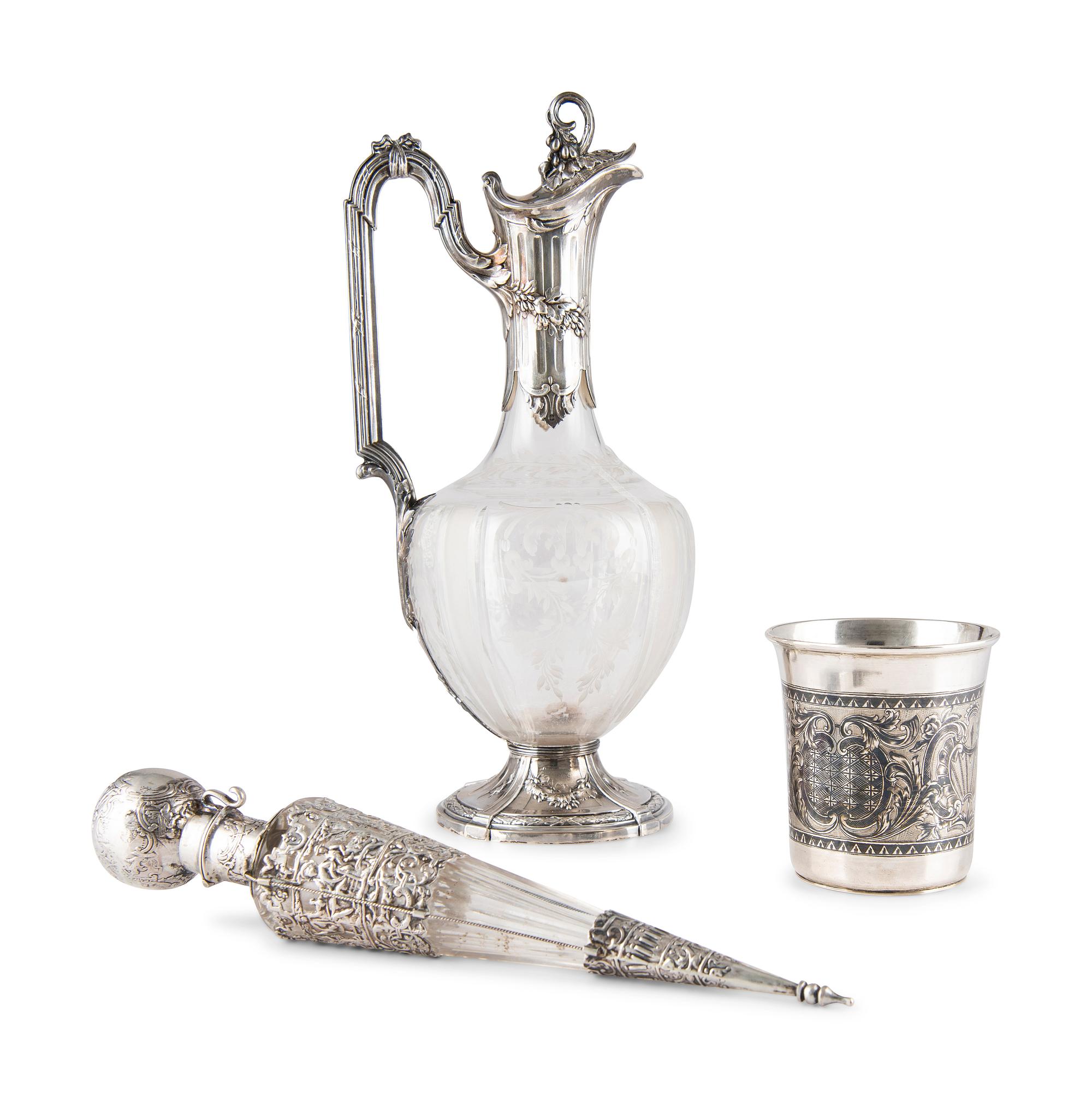 A Continental Silver Decanter, Beaker and Perfume