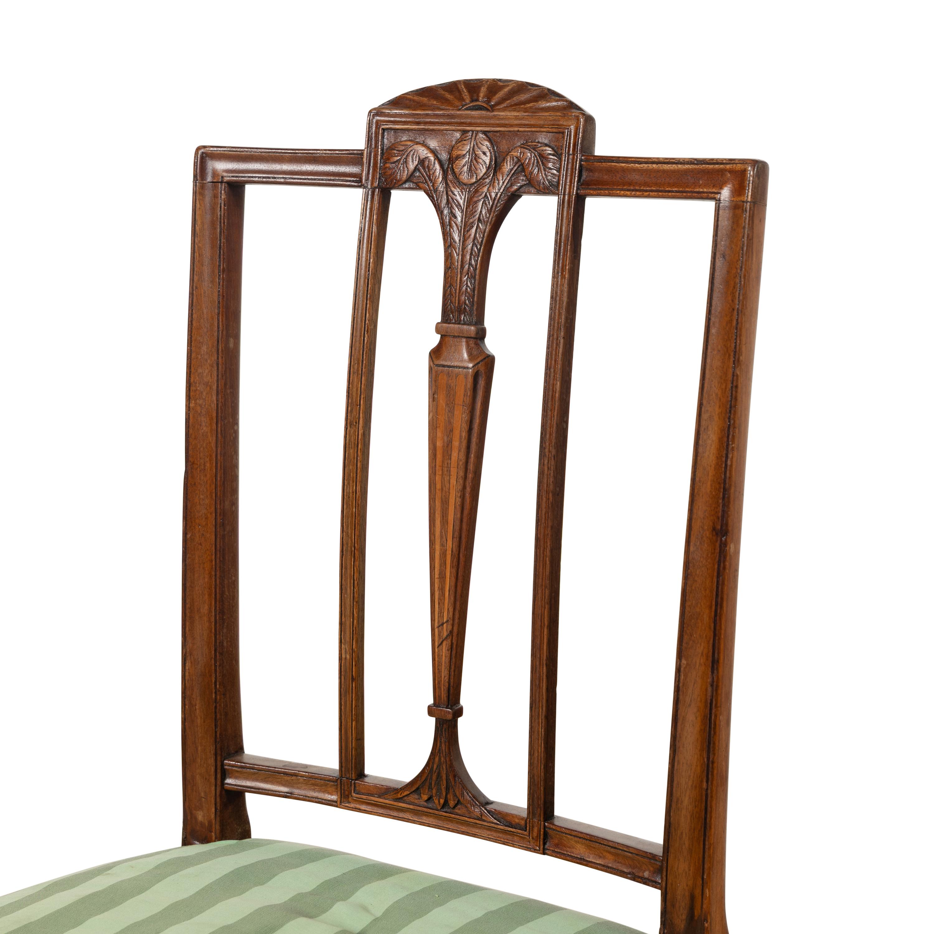 A Set of Nine George III Mahogany Dining Chairs