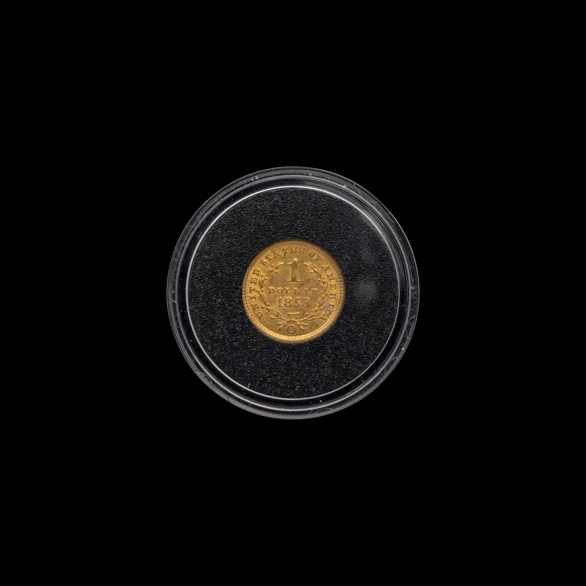 An 1853-O Liberty Head $1 Gold Coin
