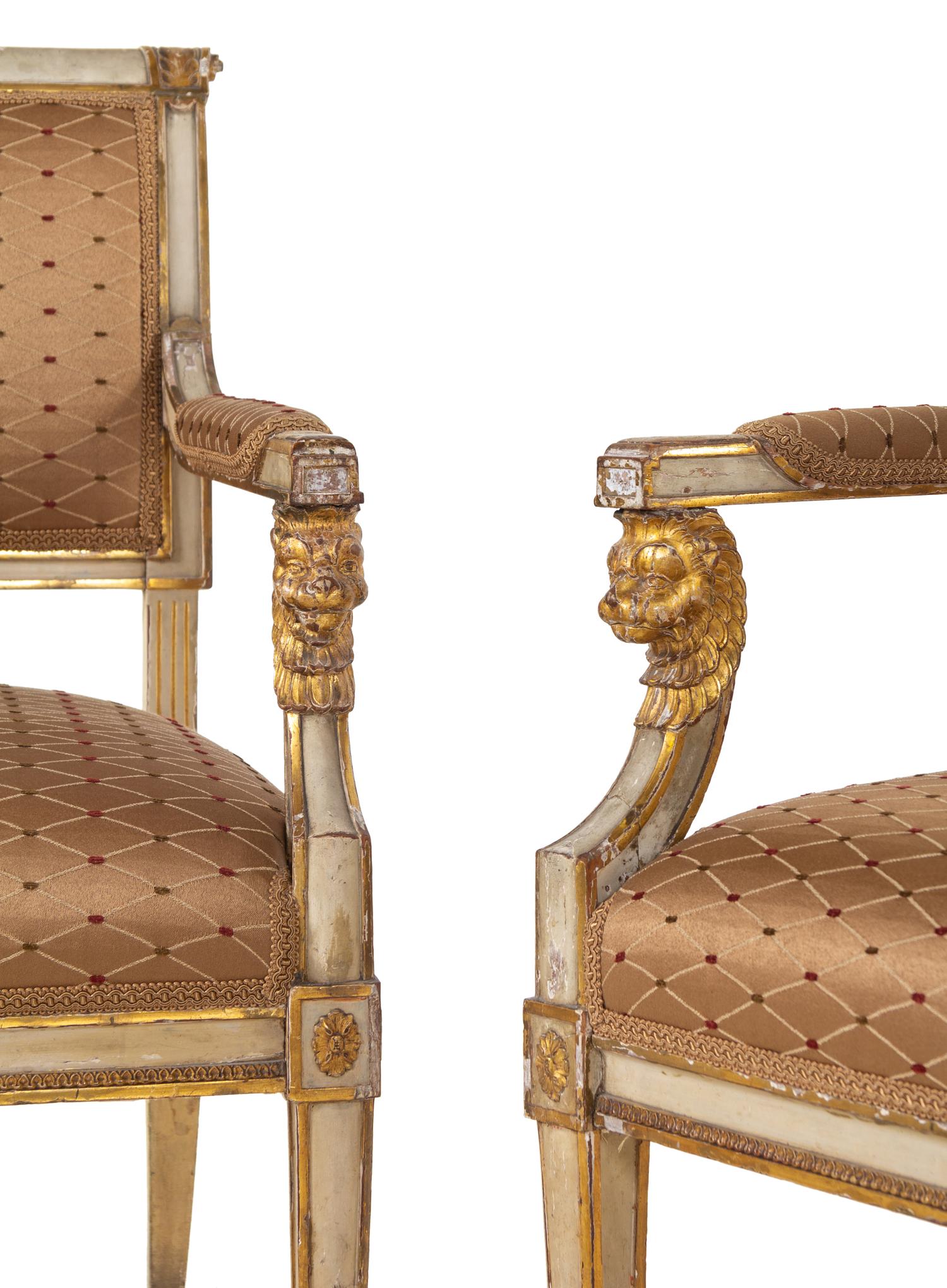 A Pair of Empire Painted and Parcel Gilt Fauteuils