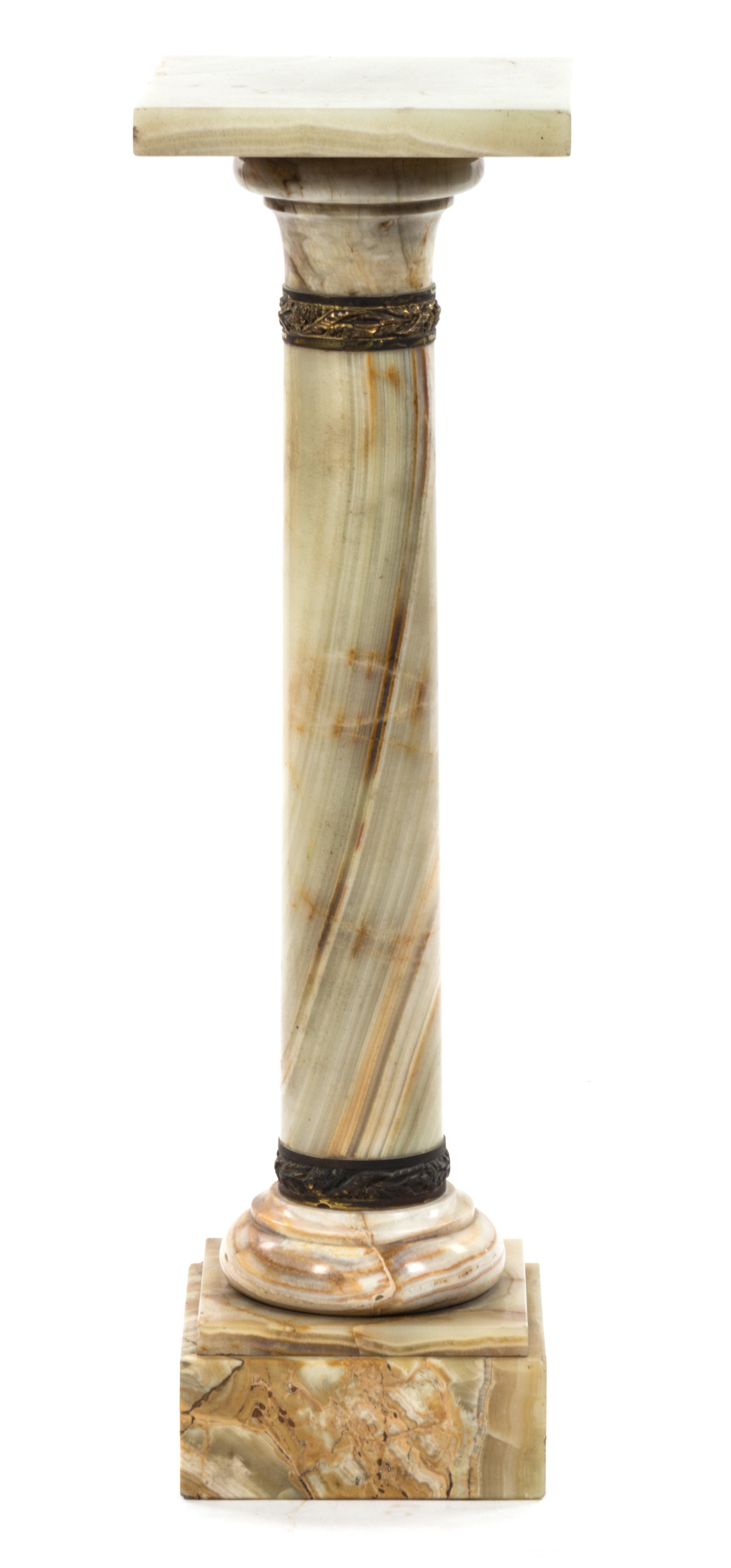 A Continental Gilt Bronze Mounted Onyx Pedestal, Height 38 1/4 inches.