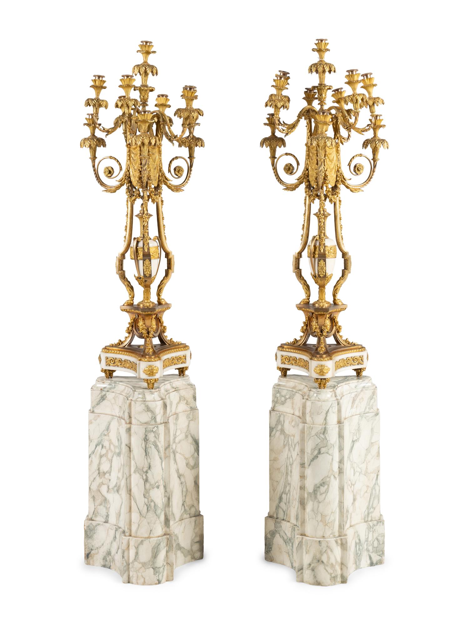 A Pair of Louis XVI Style Gilt Bronze and White Marble Ten-Light Candelabra