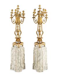 A Pair of Louis XVI Style Gilt Bronze and White Marble Ten-Light Candelabra