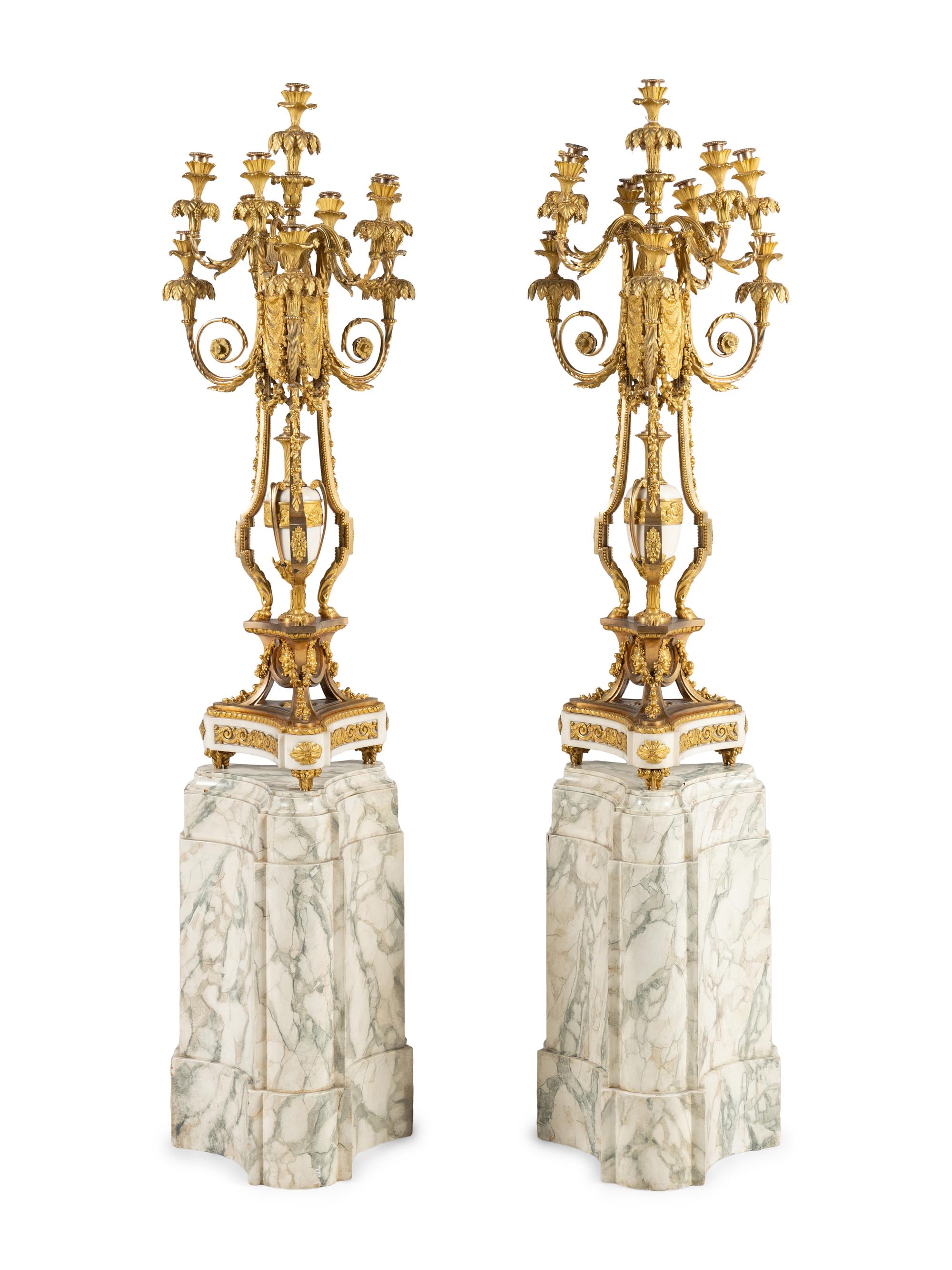A Pair of Louis XVI Style Gilt Bronze and White Marble Ten-Light Candelabra