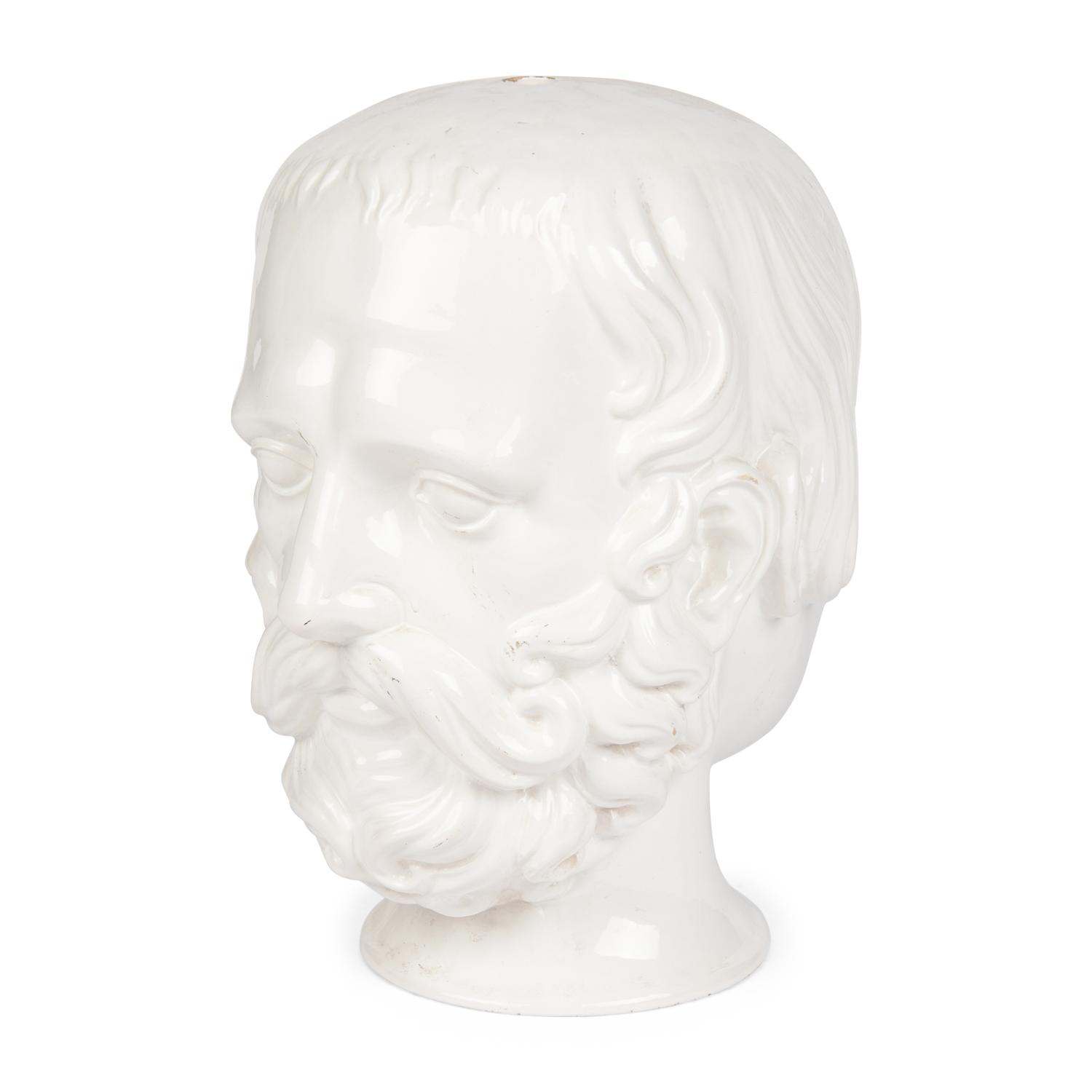 An Italian White Glazed Janiform Bust