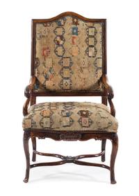 A Regence Walnut Open Armchair Height 48 1/2 inches. — 18TH CENTURY